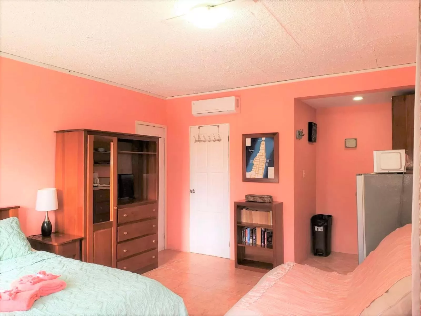 TV/Entertainment Center in Beach Side Condos Caye Caulker by CCVH