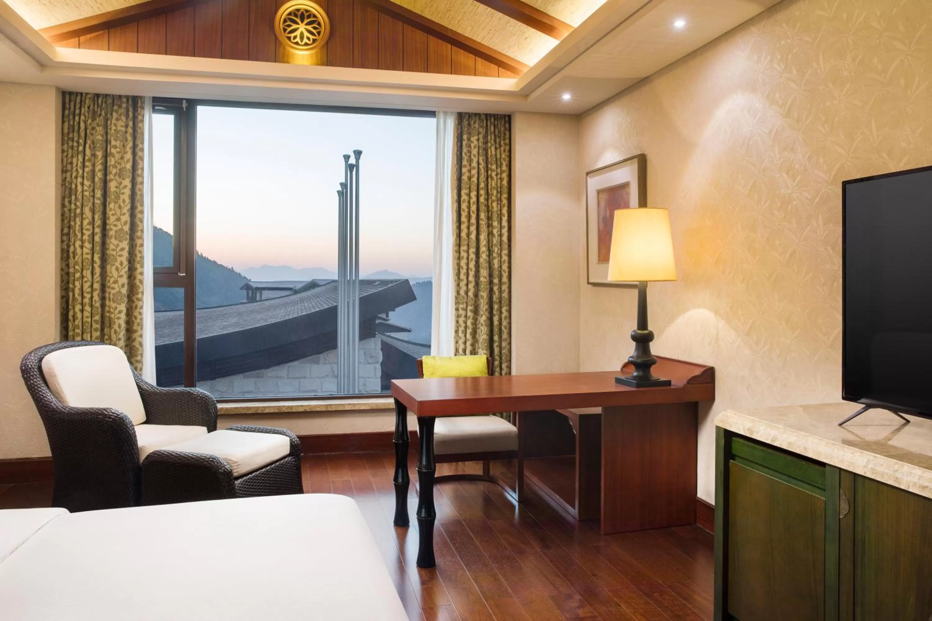 Seating area, Bed in Hilton Sanqingshan Resort