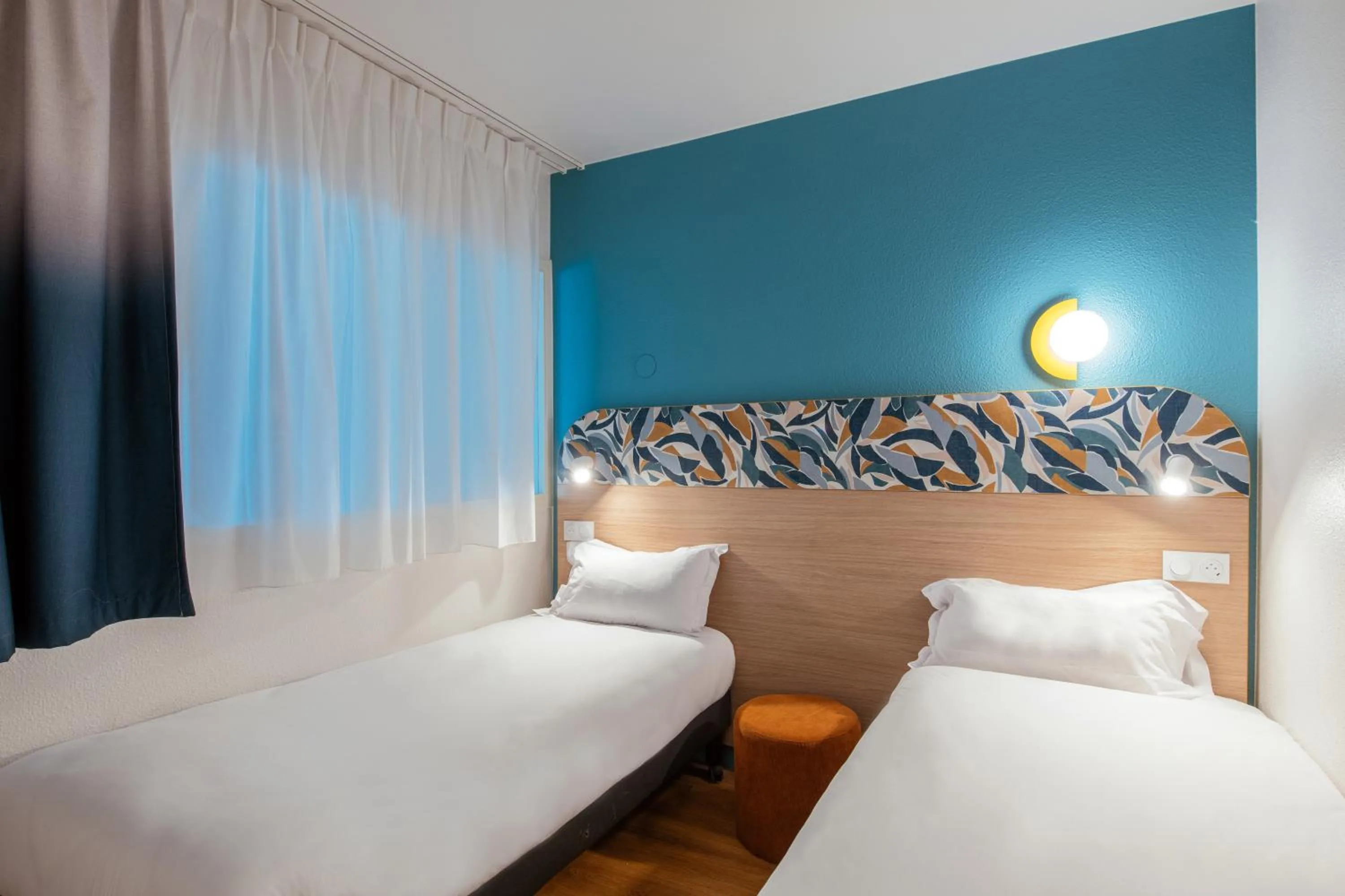 Bed in Aparthotel Adagio Access Paris La Villette