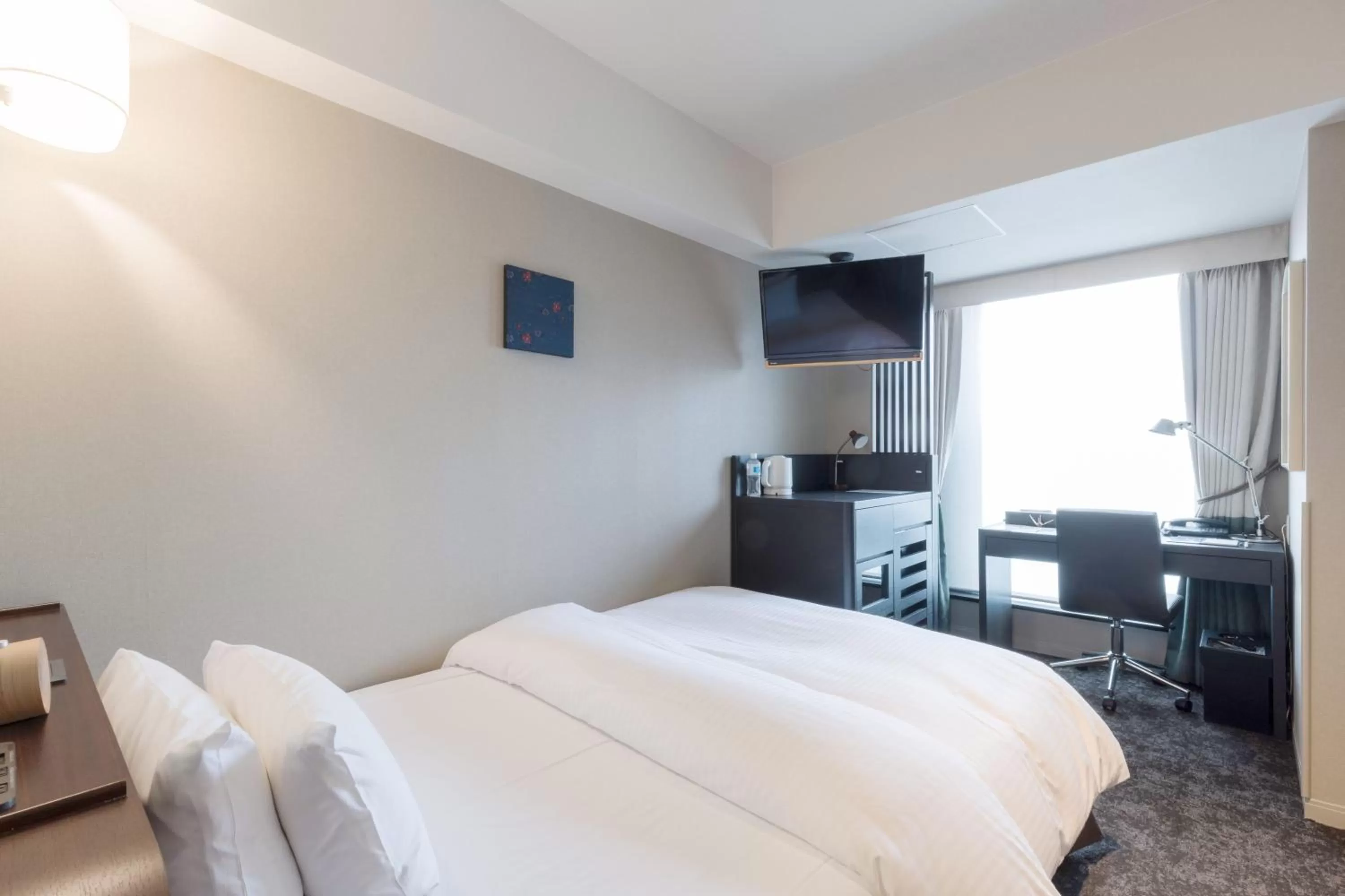 Bed in SHIROYAMA HOTEL kagoshima