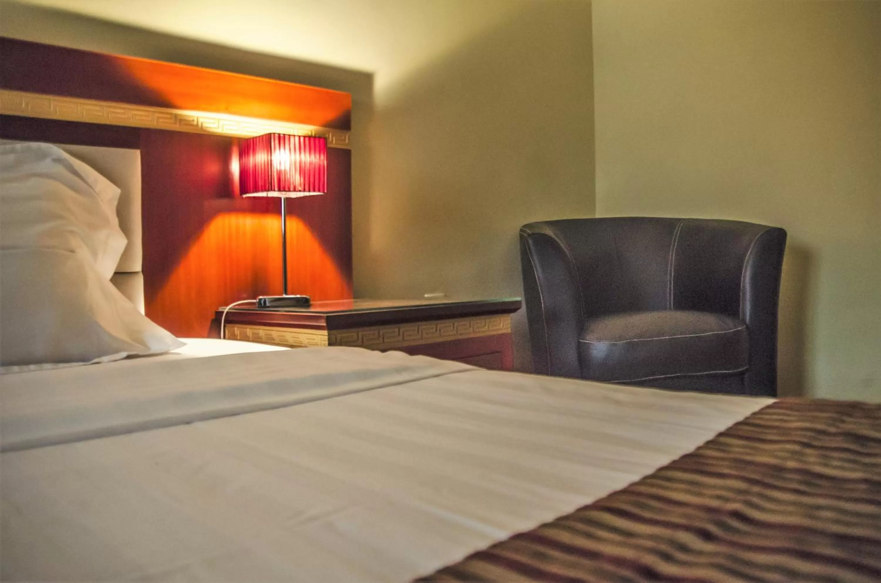 Seating area, Bed in Hotel Rosebud