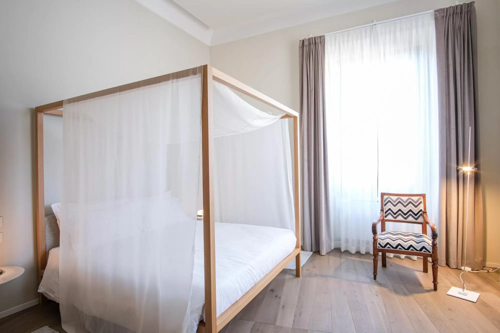 Bed in Dimora de Matera Luxury Suites