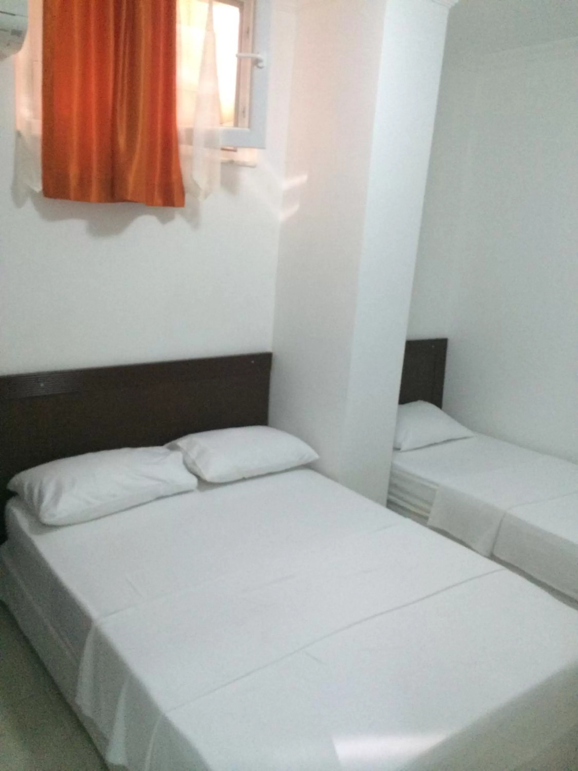 Bed in Mutado Hotel