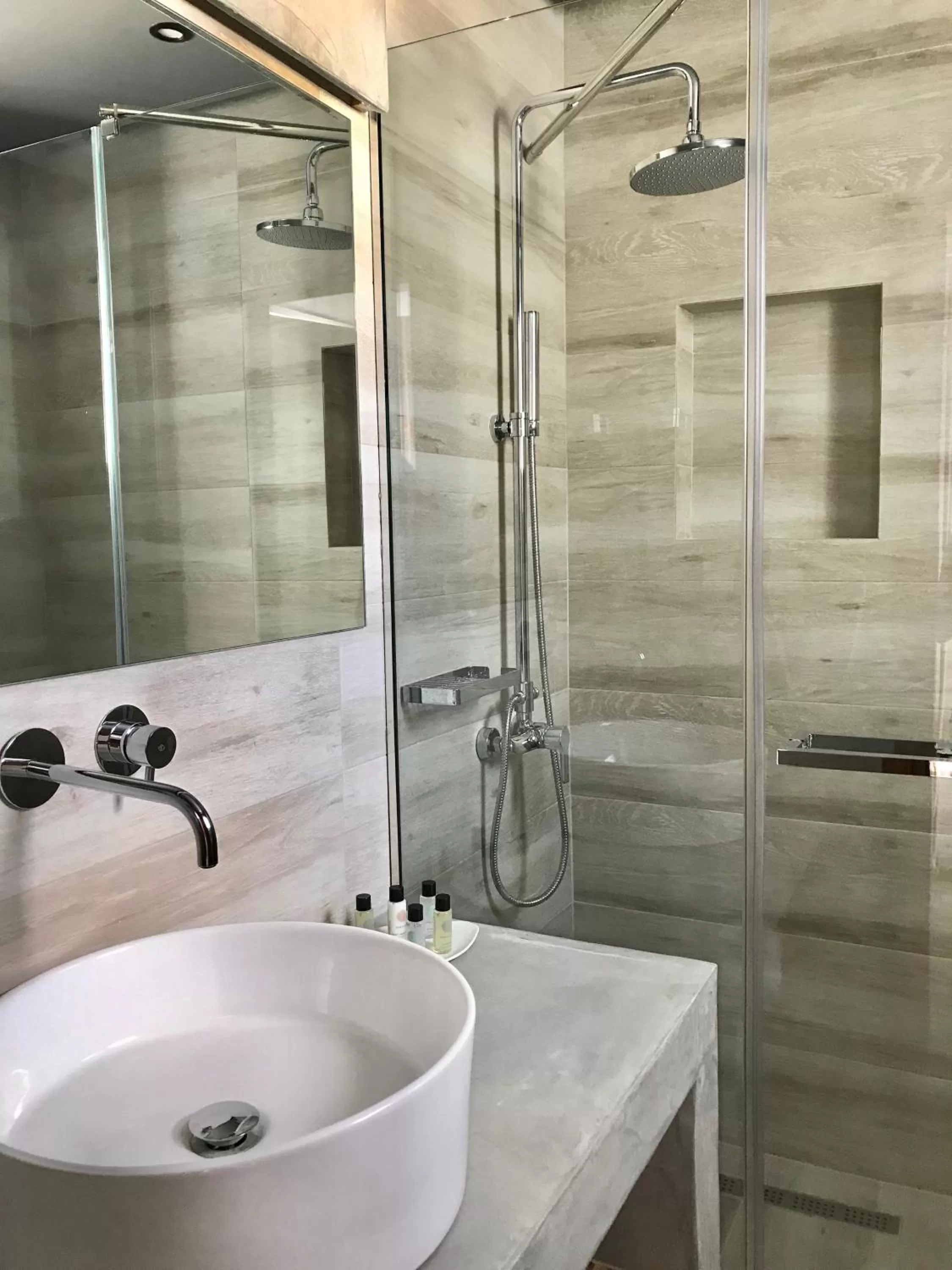 Shower in AELLIA HOTEL & SUITES LEROS