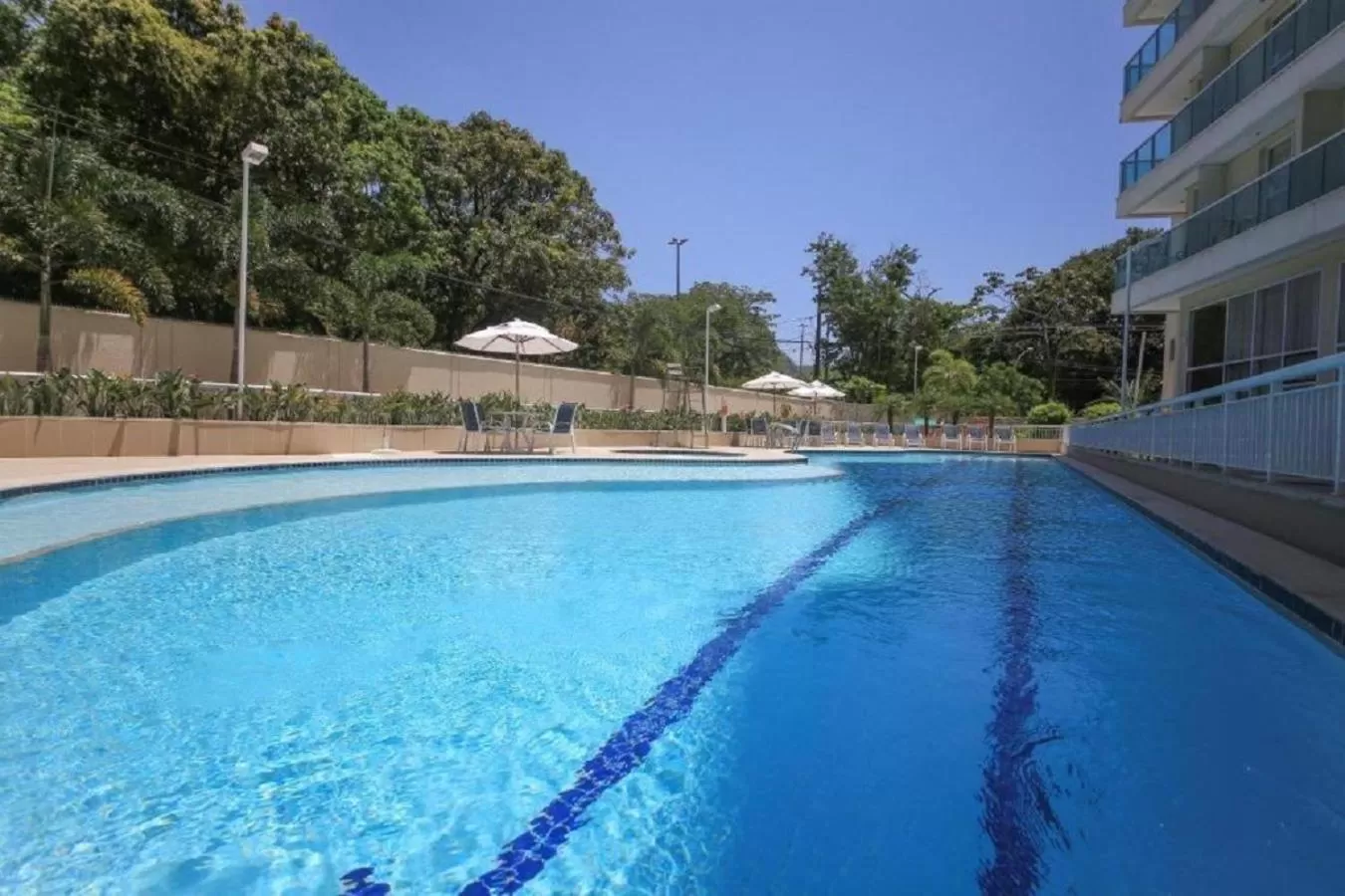 Property building, Swimming Pool in Suíte & Flat Premium Rio Stay - Rio Centro