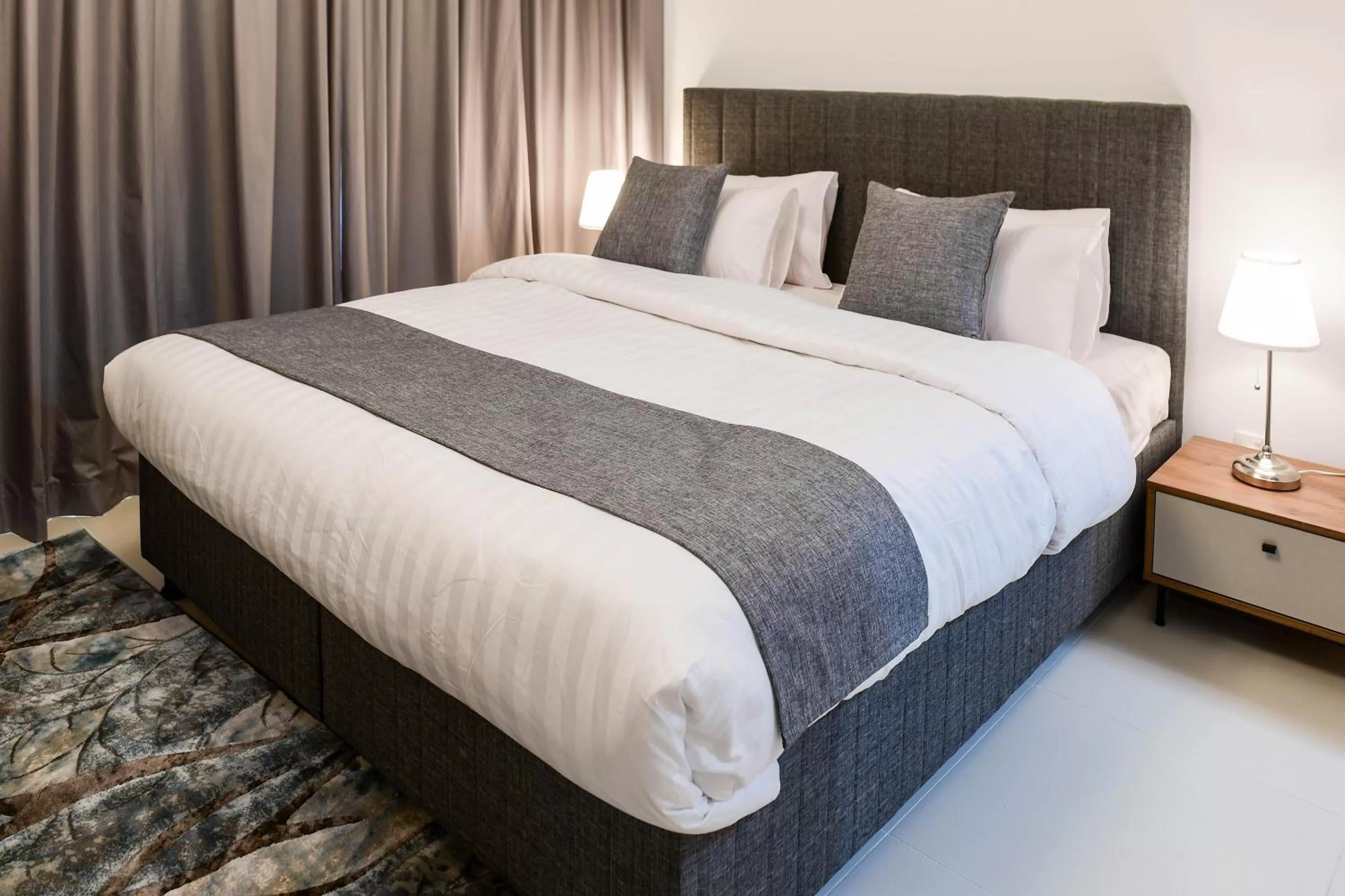 Bed in Noor Amwaj Hotel & Apartment