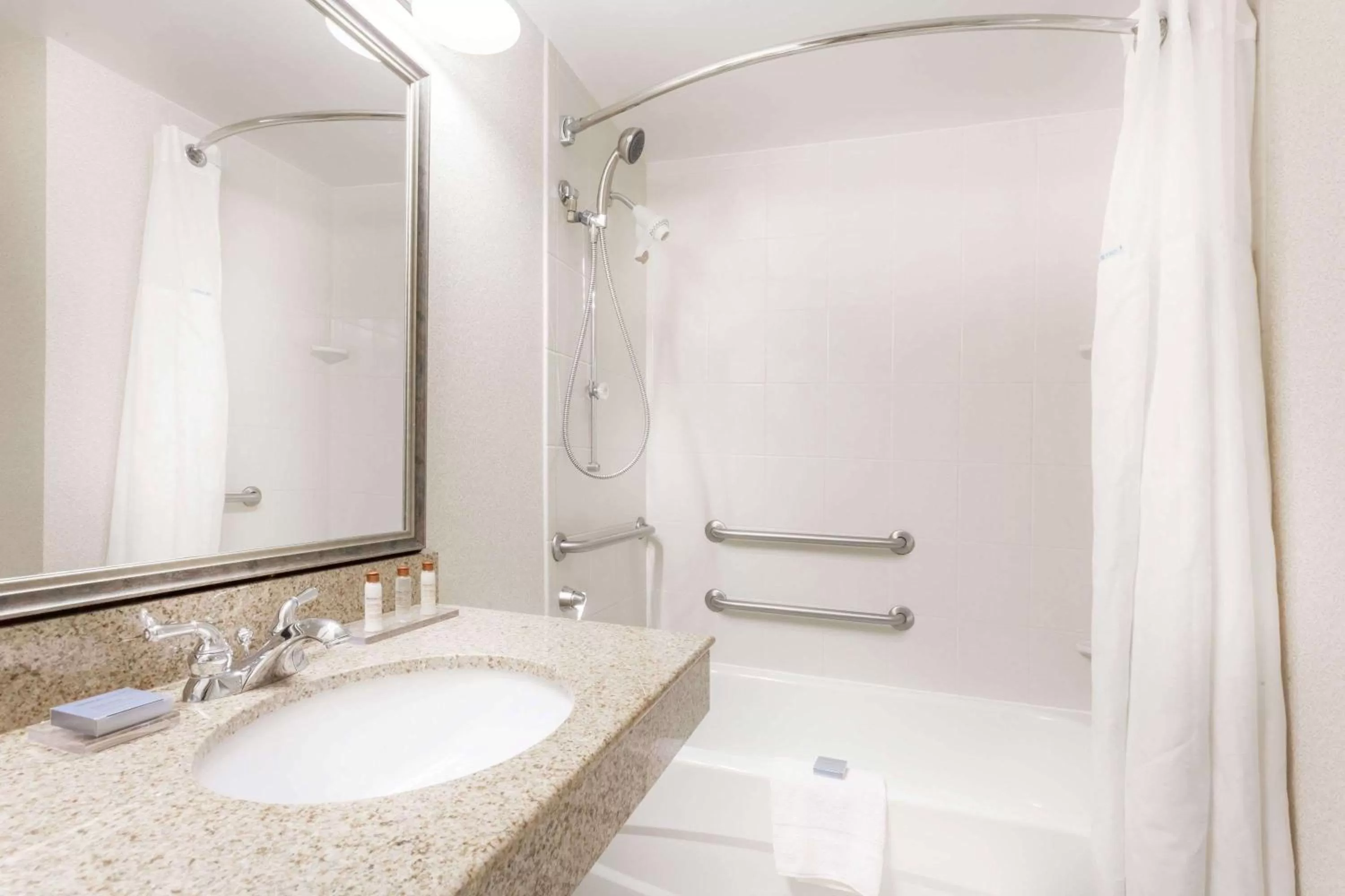 Bathroom in Lexington Expo Hotel by IHG