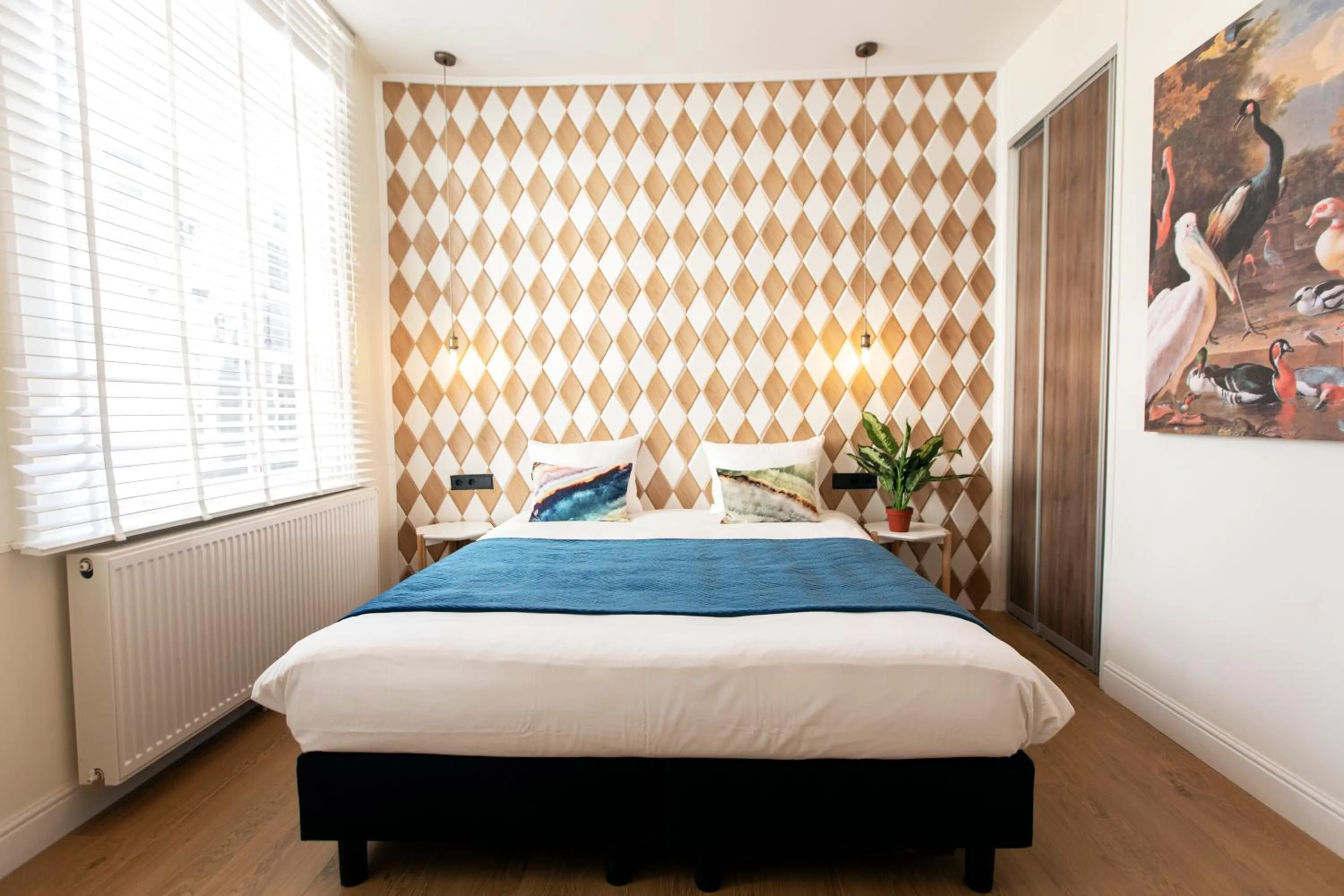 Bed in Quentin Golden Bear Hotel