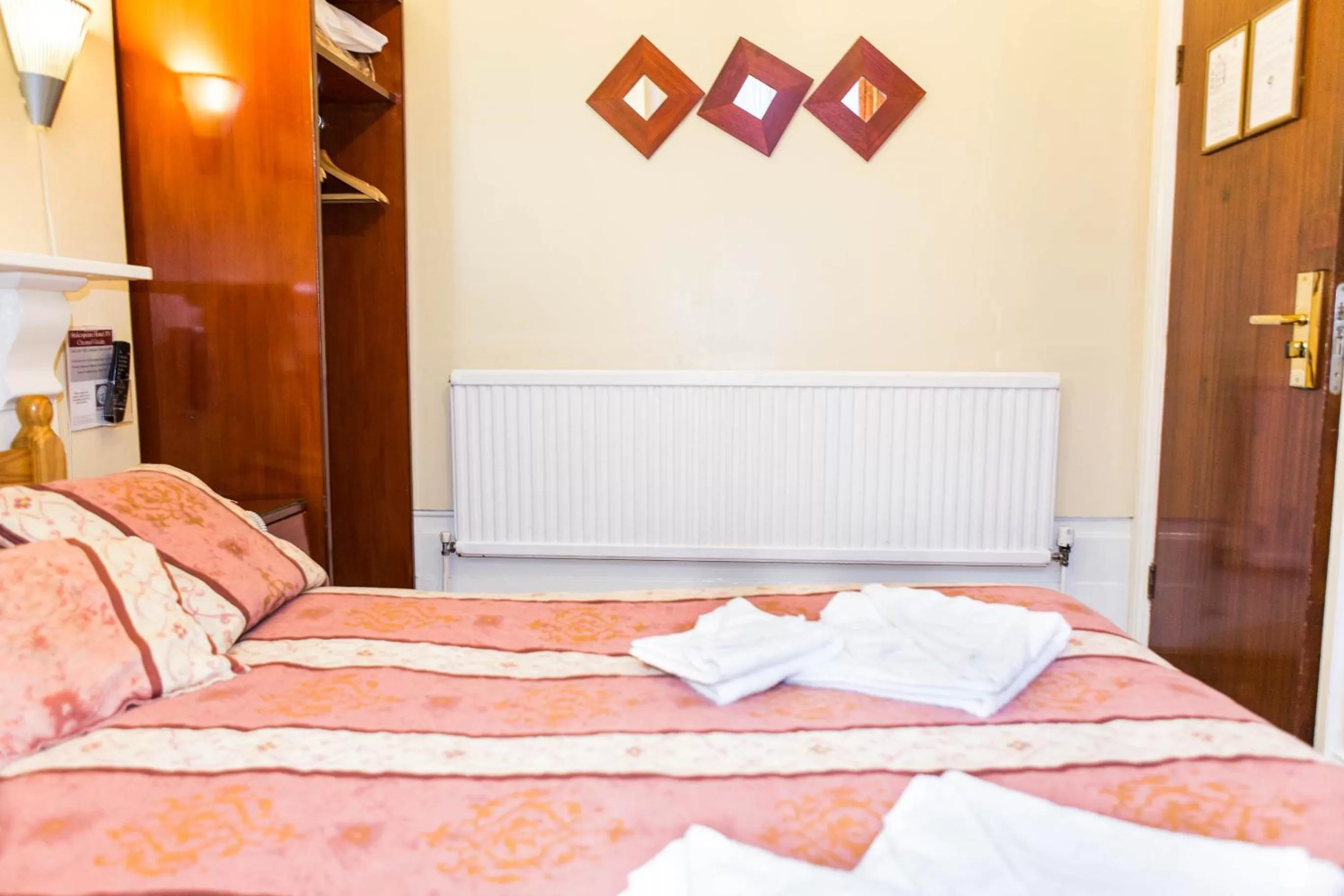 Bed in Shakespeare Hotel