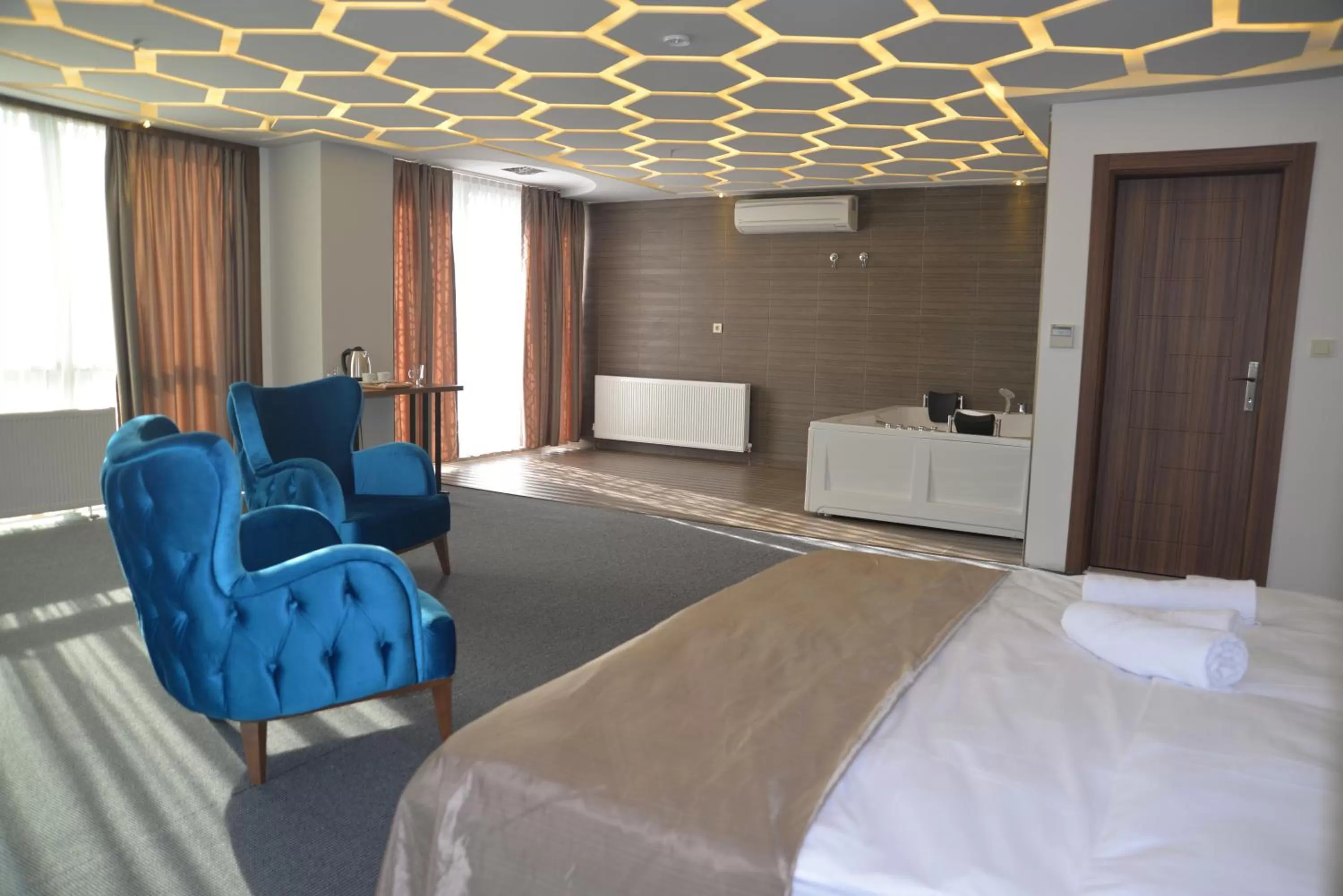 Bed in TEVETOGLU HOTEL