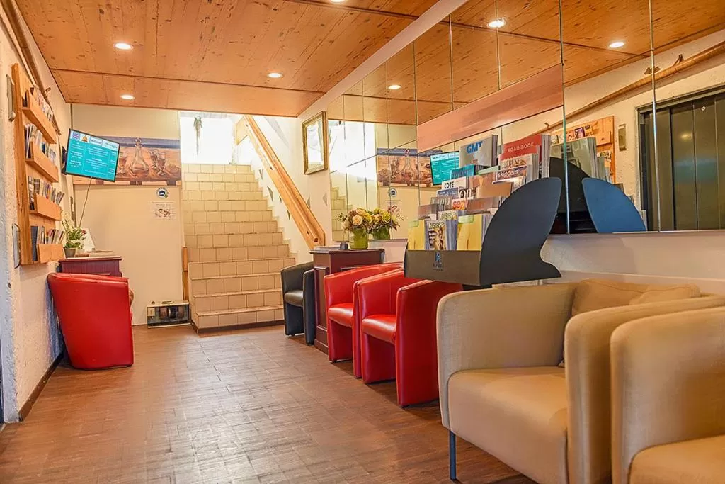 Lobby or reception in Hotel des Alpes Bulle center