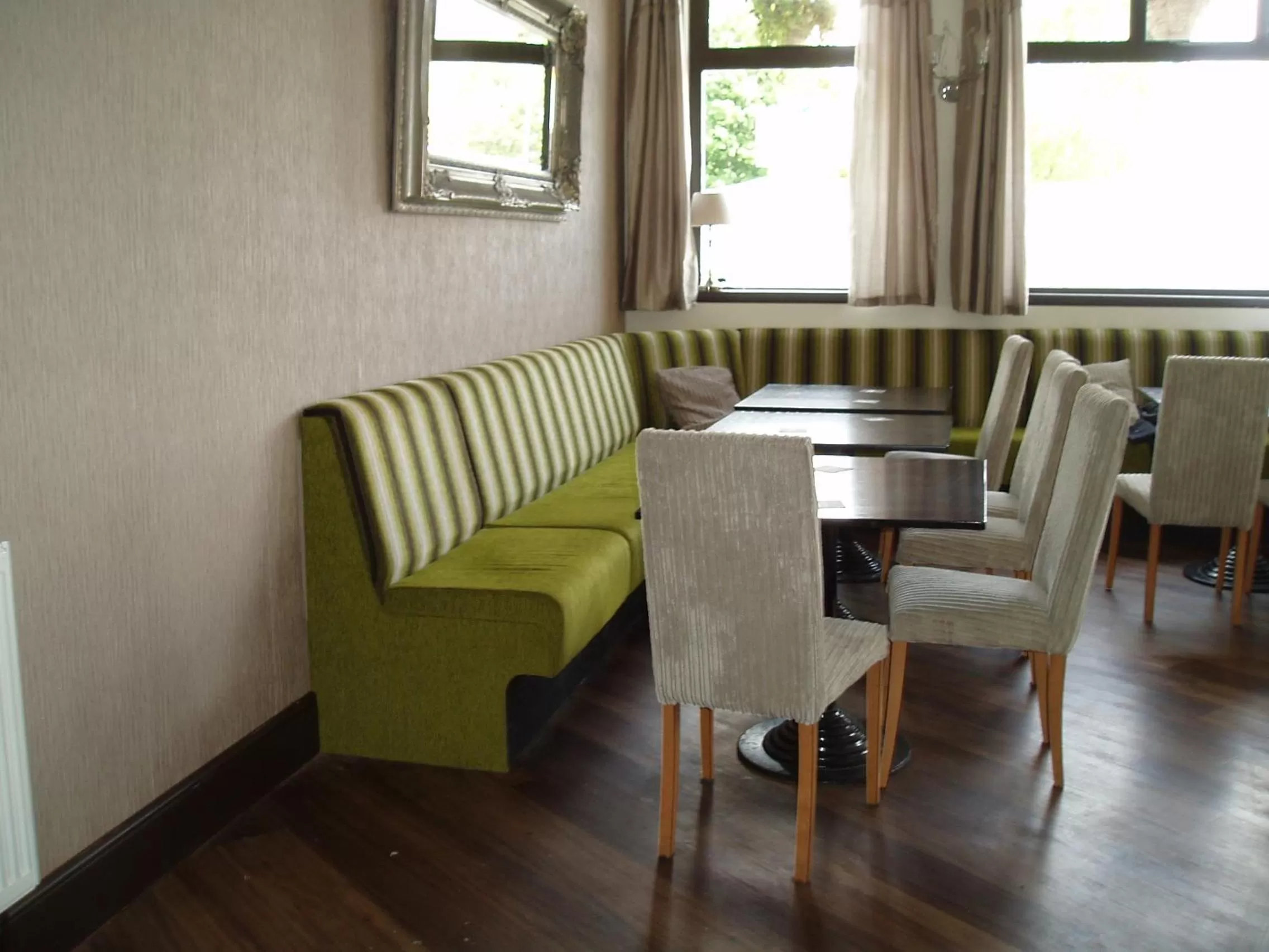 Communal lounge/ TV room in The Whittington and Cat