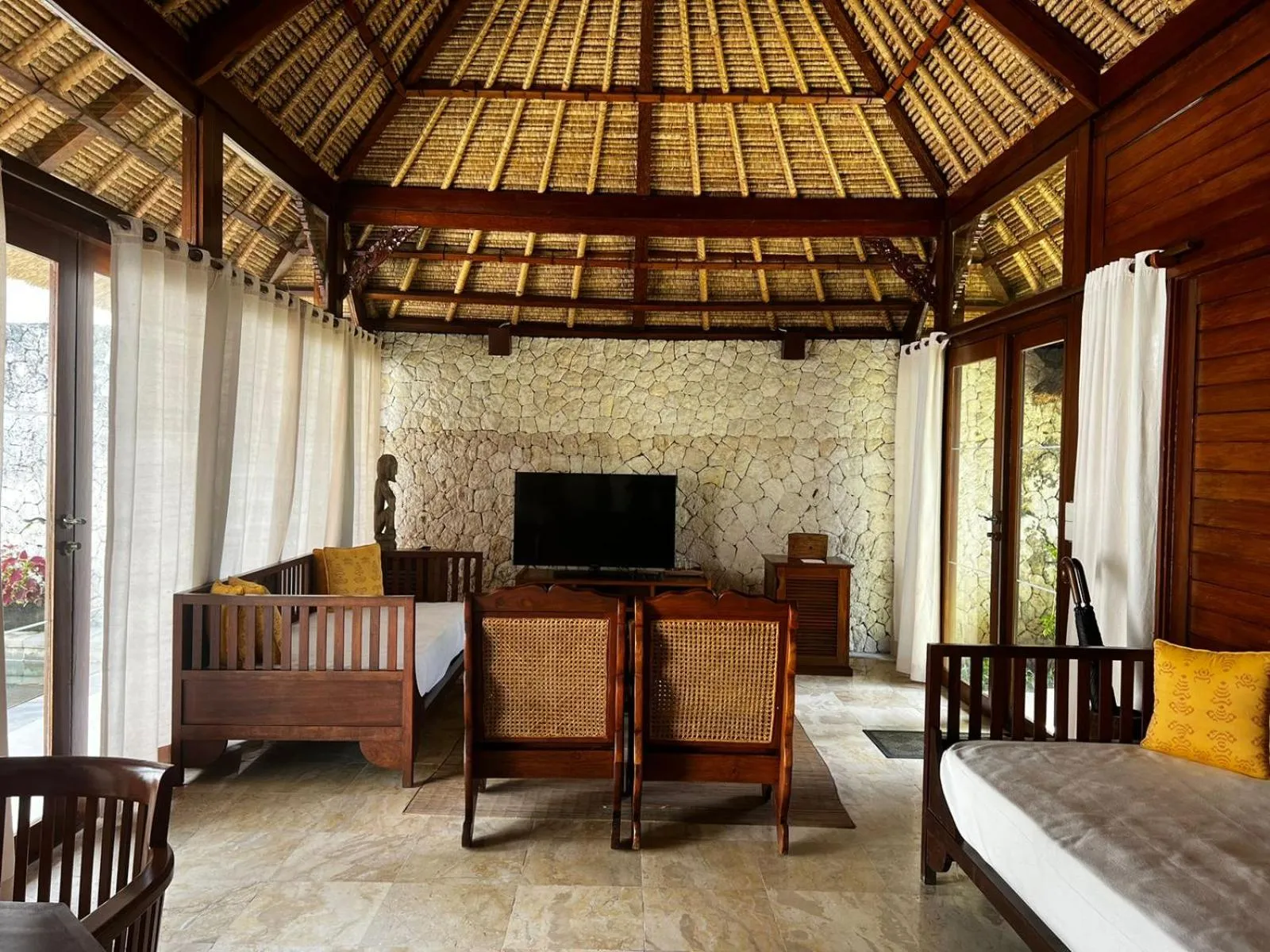 Living room, Bed in Jimbaran Puri, A Belmond Hotel, Bali