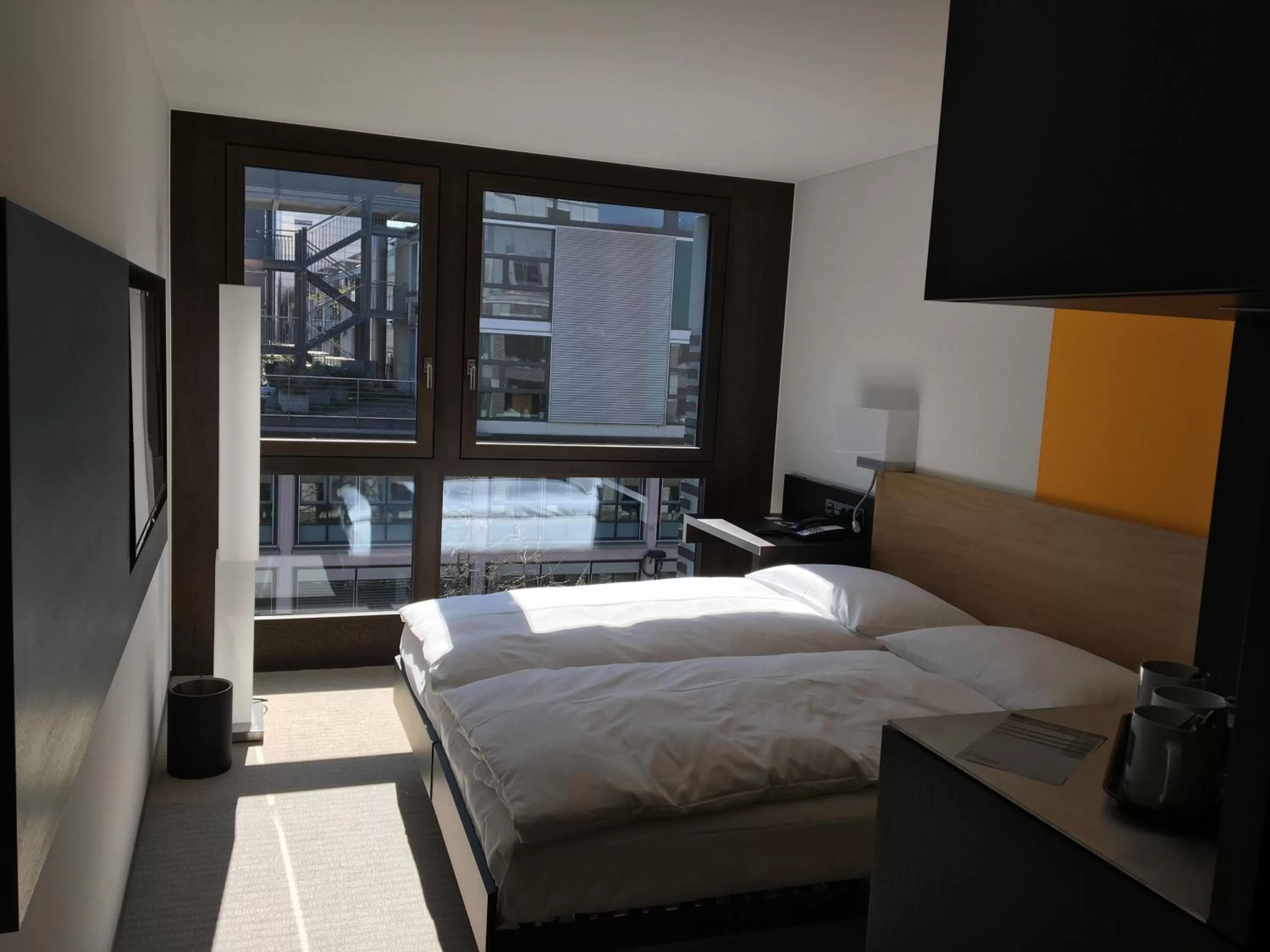 Photo of the whole room, Bed in Züri by Fassbind