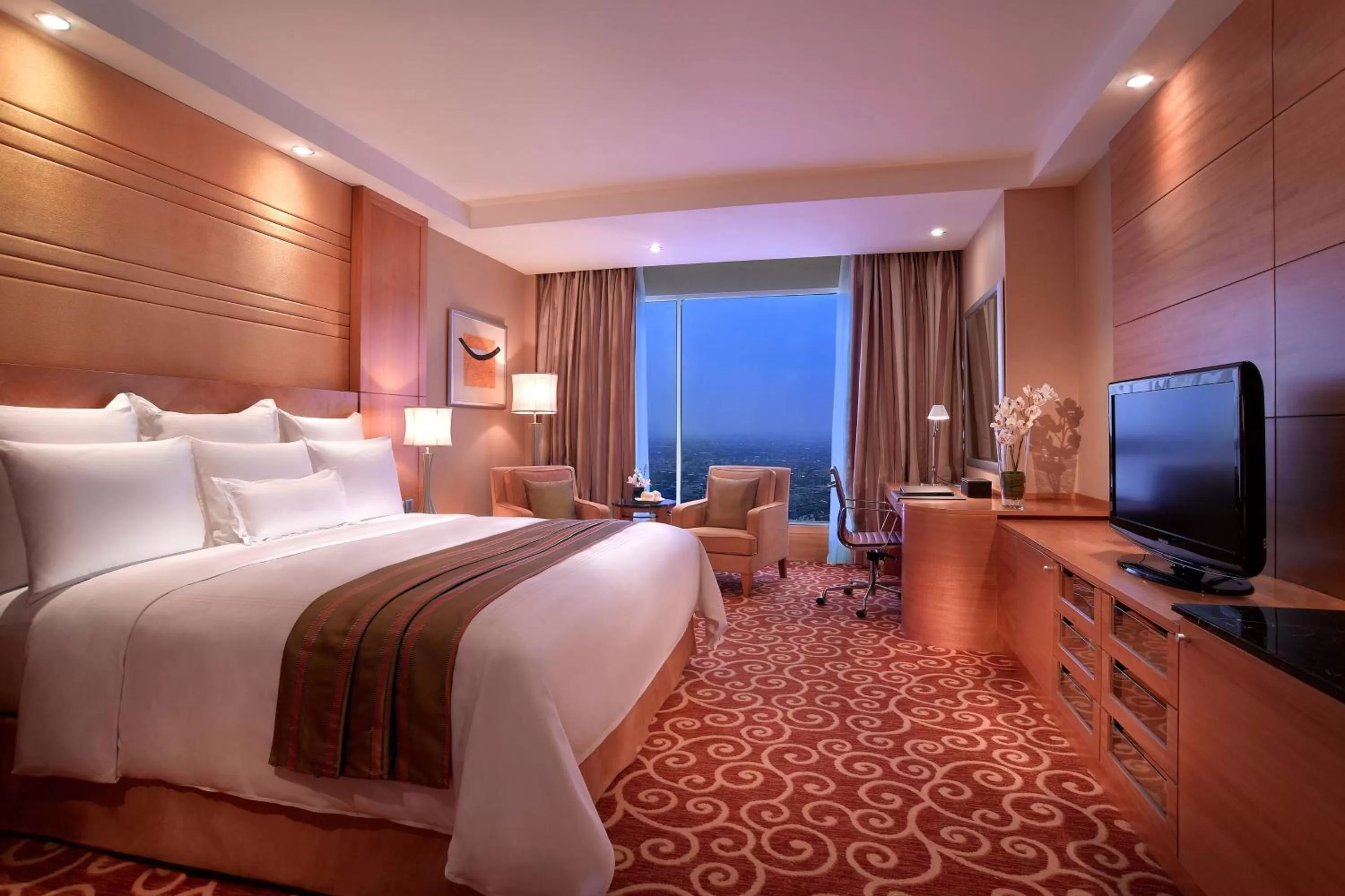 Photo of the whole room, Bed in JW Marriott Hotel Medan