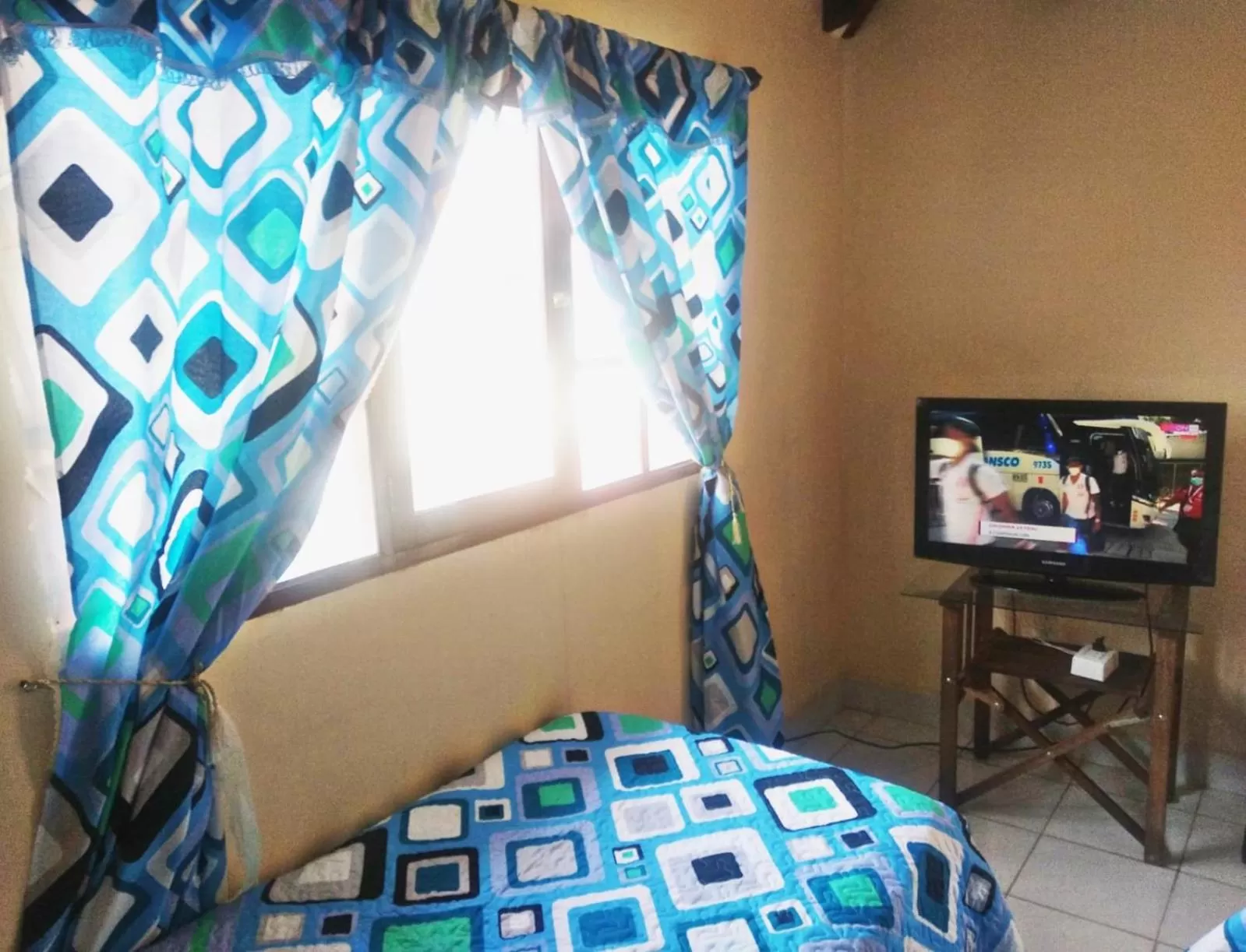 Bed, Seating Area in Residencial Moroni - Alojamiento en Cochabamba