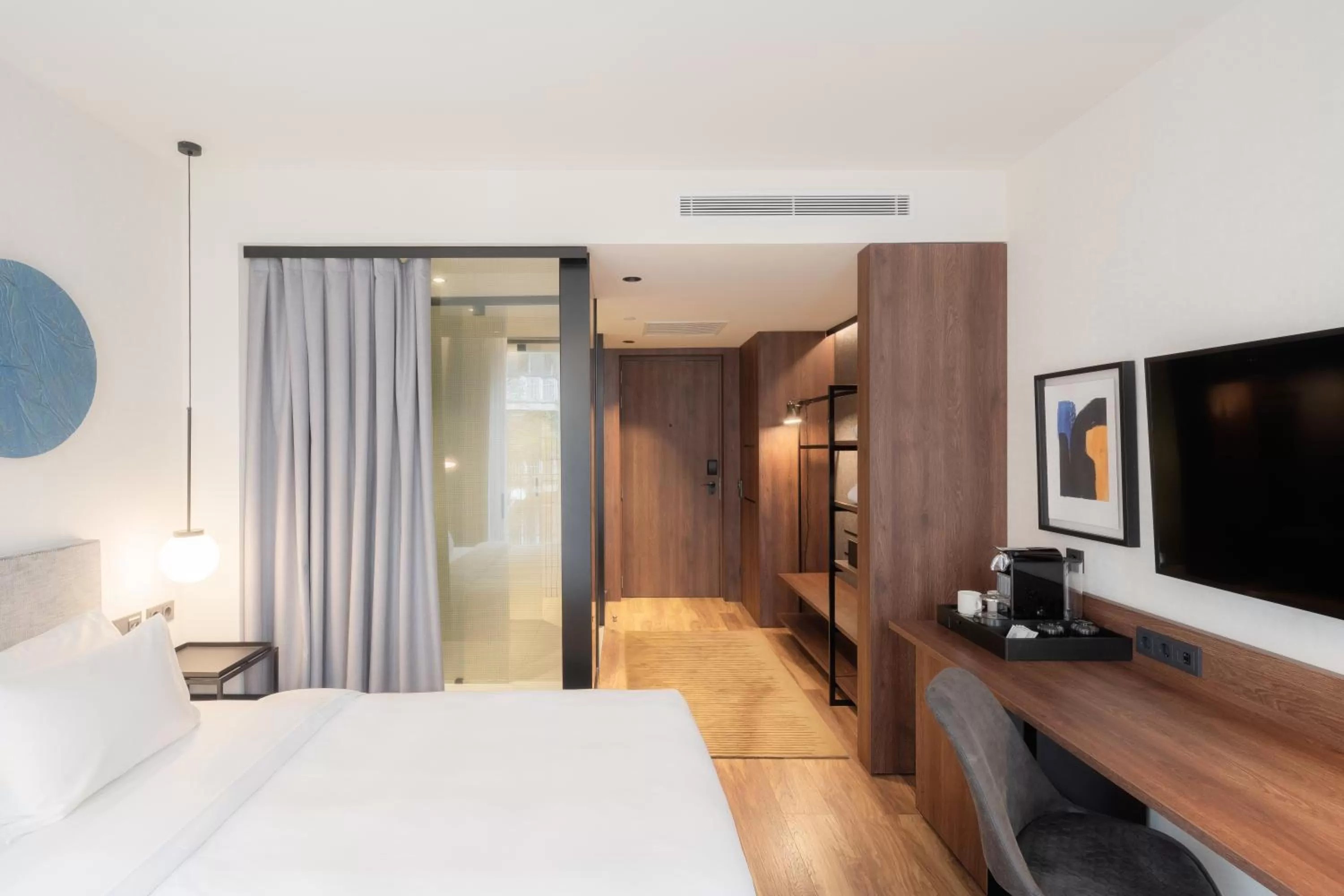 Photo of the whole room, Bed in Radisson Blu 1882 Hotel, Barcelona Sagrada Familia