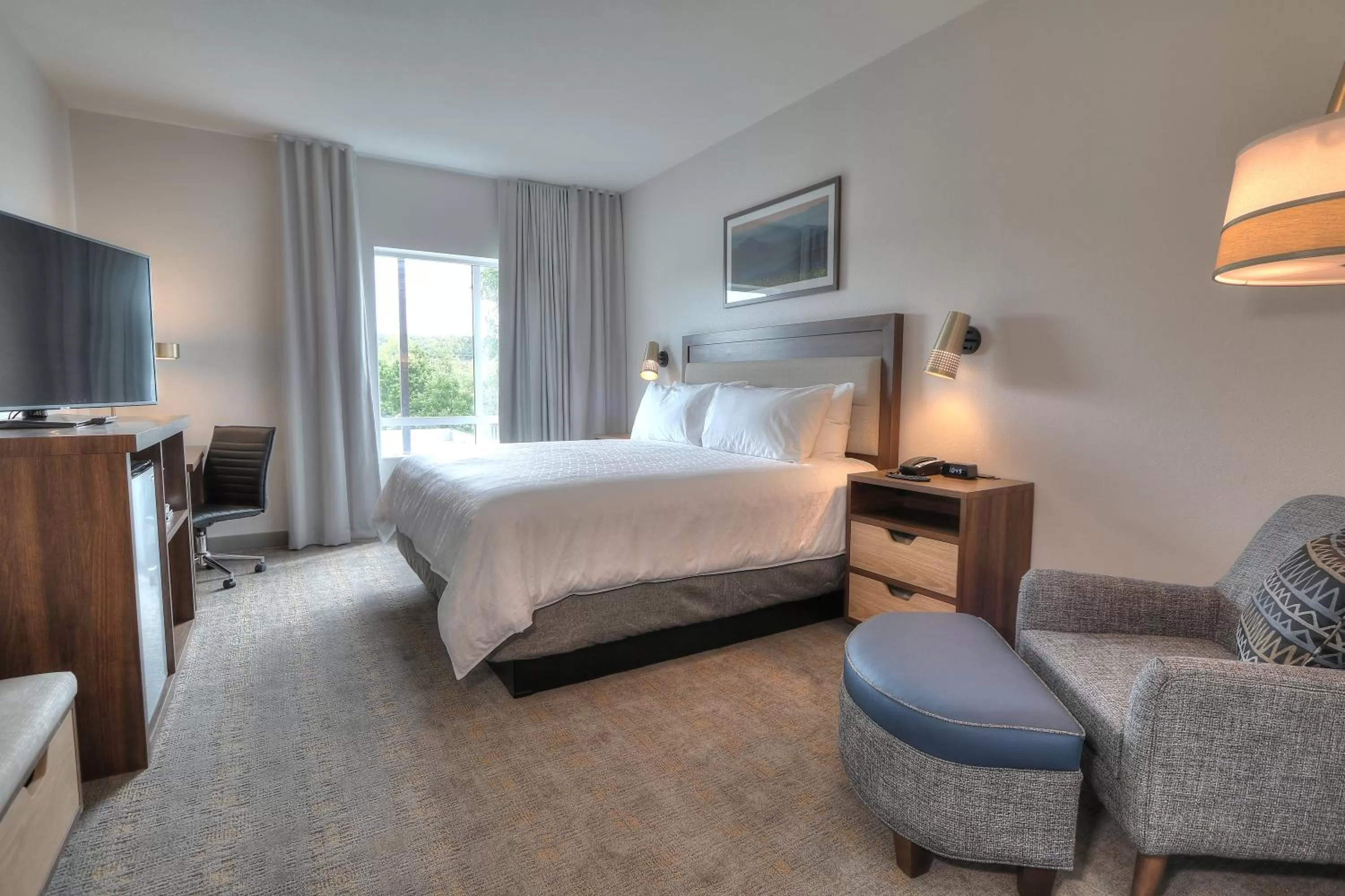 Bedroom, Bed in Holiday Inn & Suites Pigeon Forge Convention Center by IHG