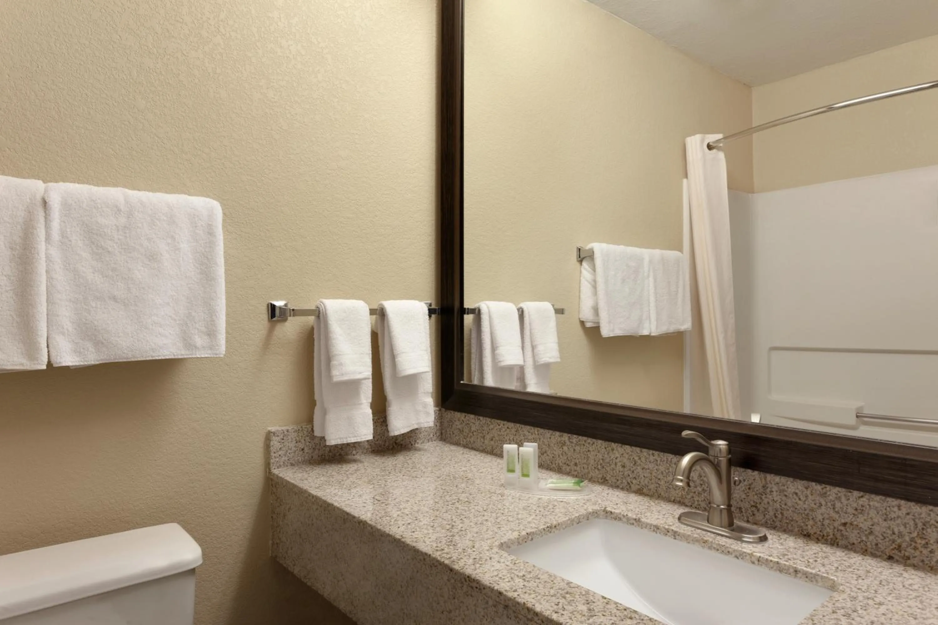 Bathroom in AmericInn by Wyndham Salina