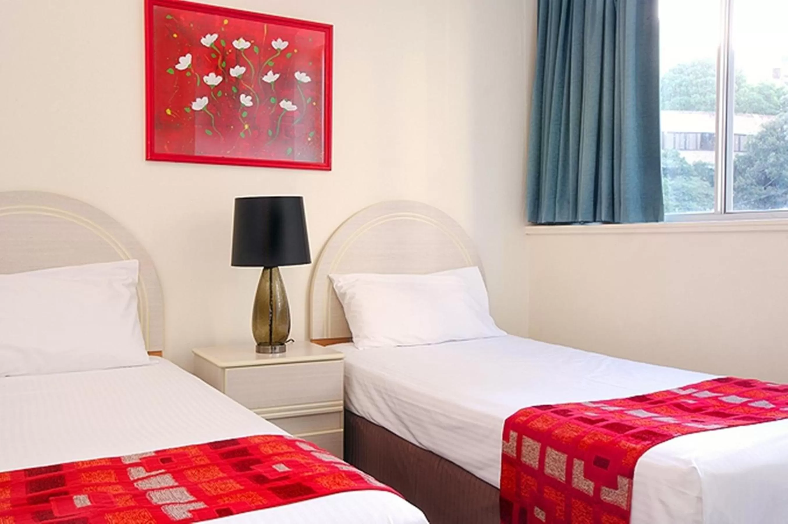 Bed in Chasely Apartment Hotel