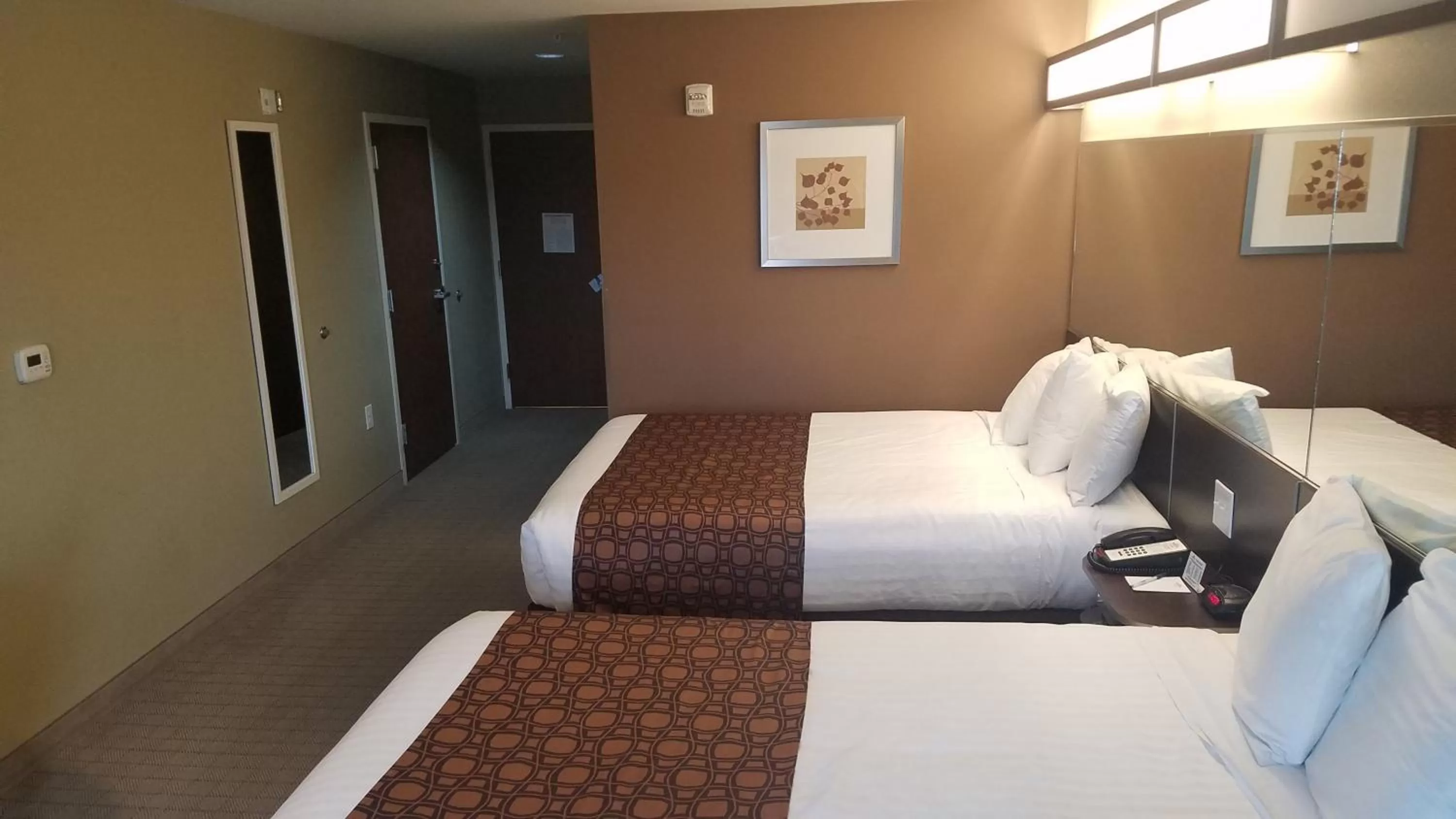 Bed in Microtel Inn & Suites by Wyndham