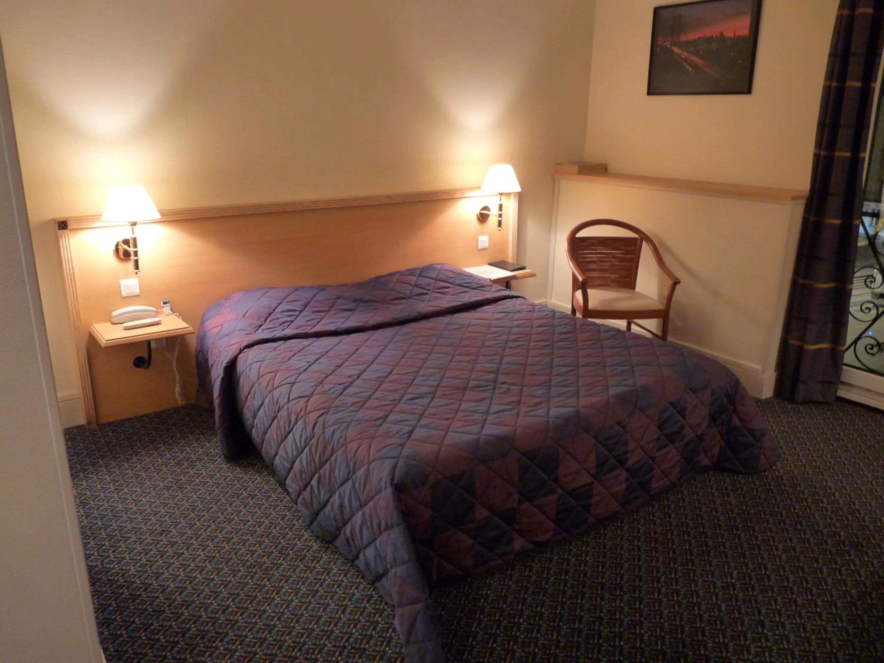 Bed in Hotel Le Bourbon Pau Centre