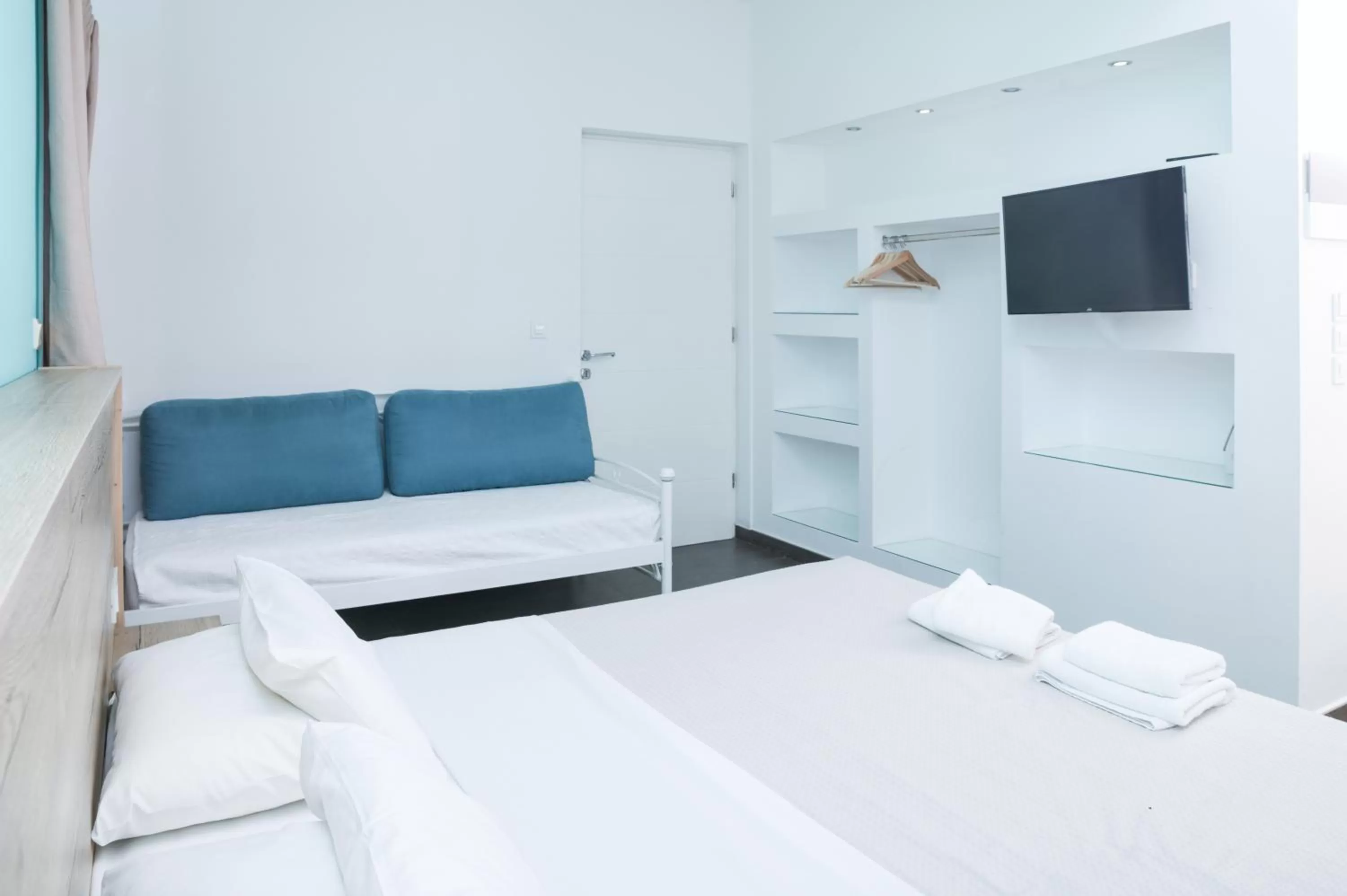 Bed in Ikaros Art Hotel