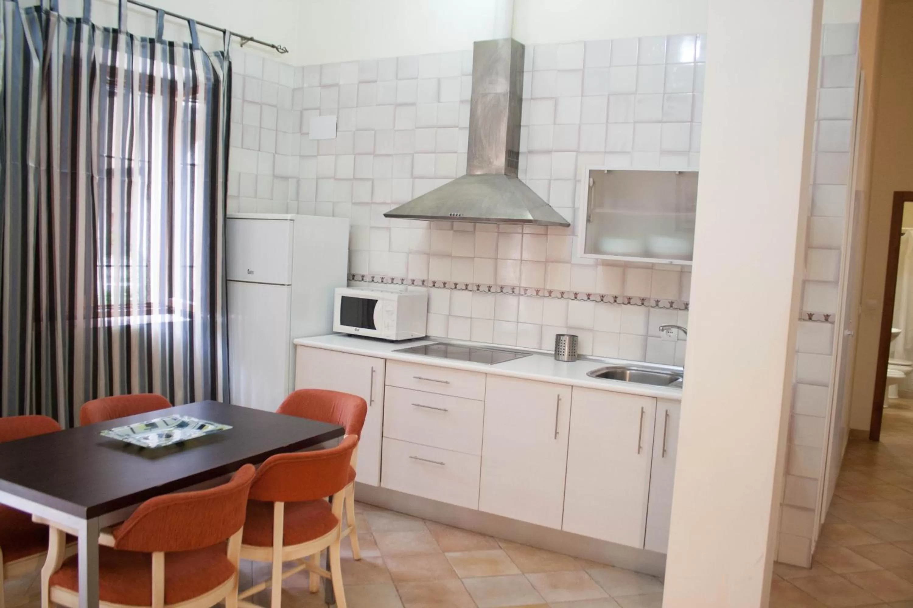 Kitchen or kitchenette in Abadia Suites