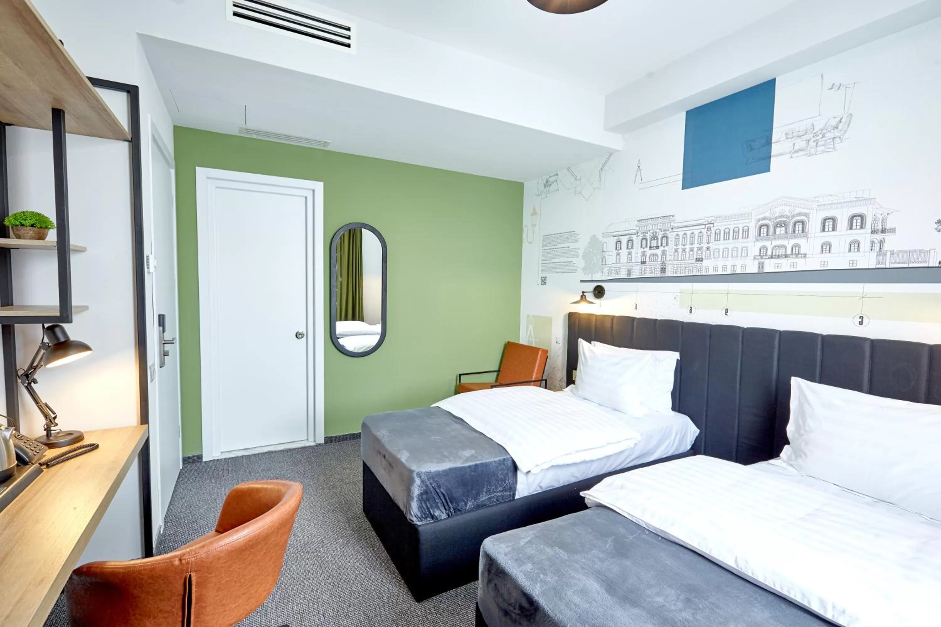 Bed in Graphica Tbilisi Hotel