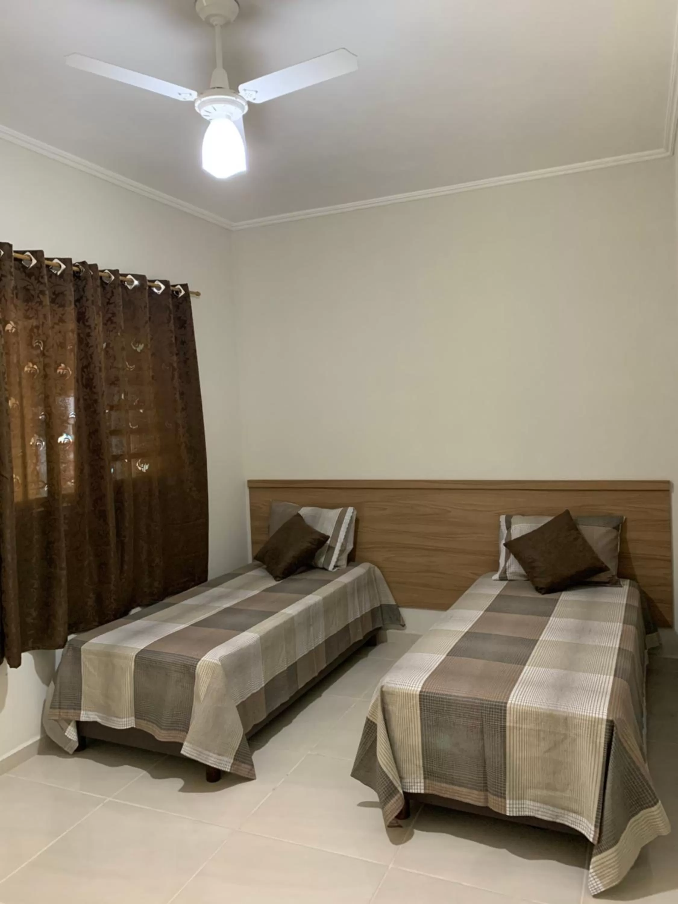 Bed in Ananda pousada chalé