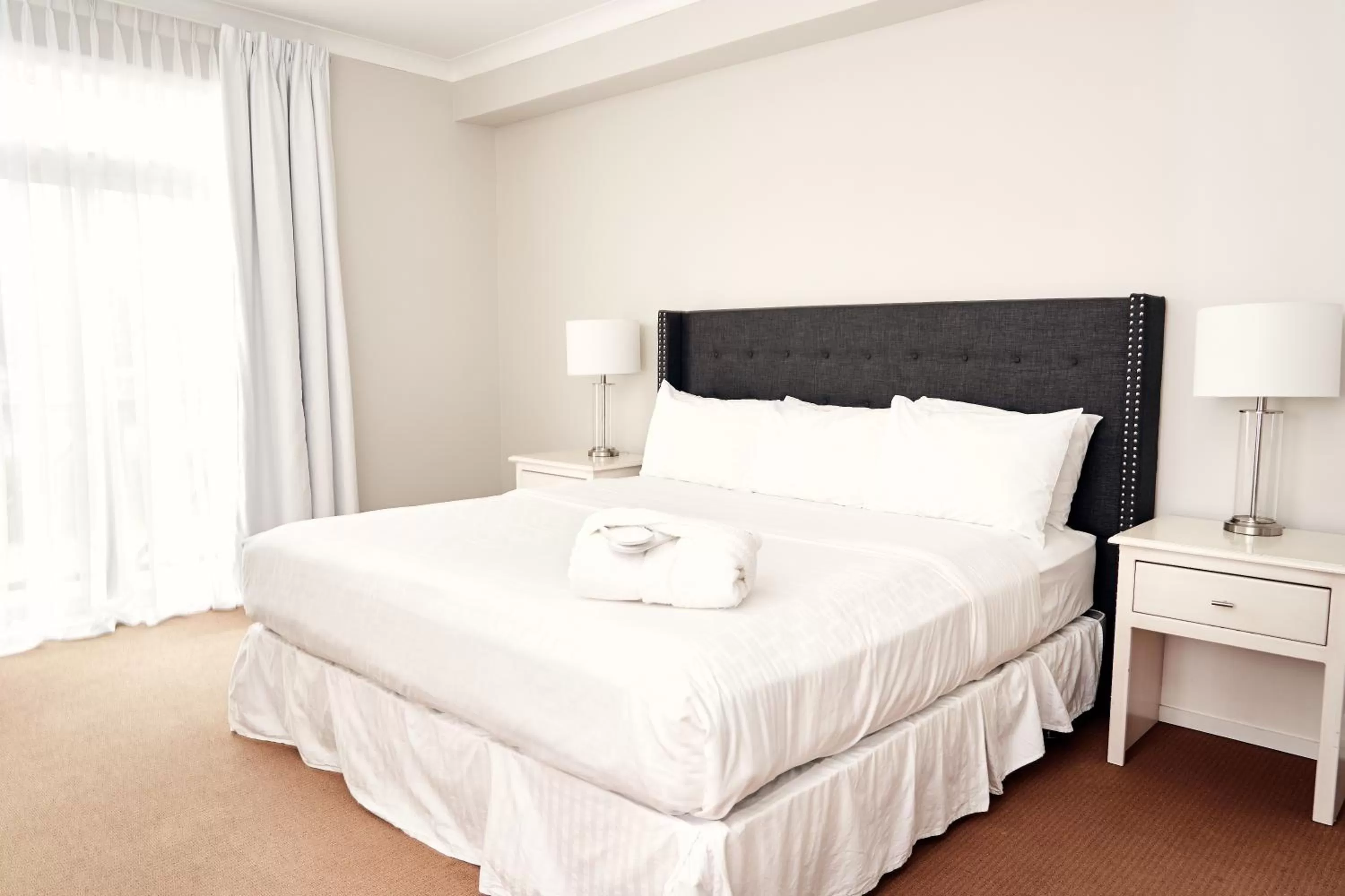 Bed in RiverRock Inn