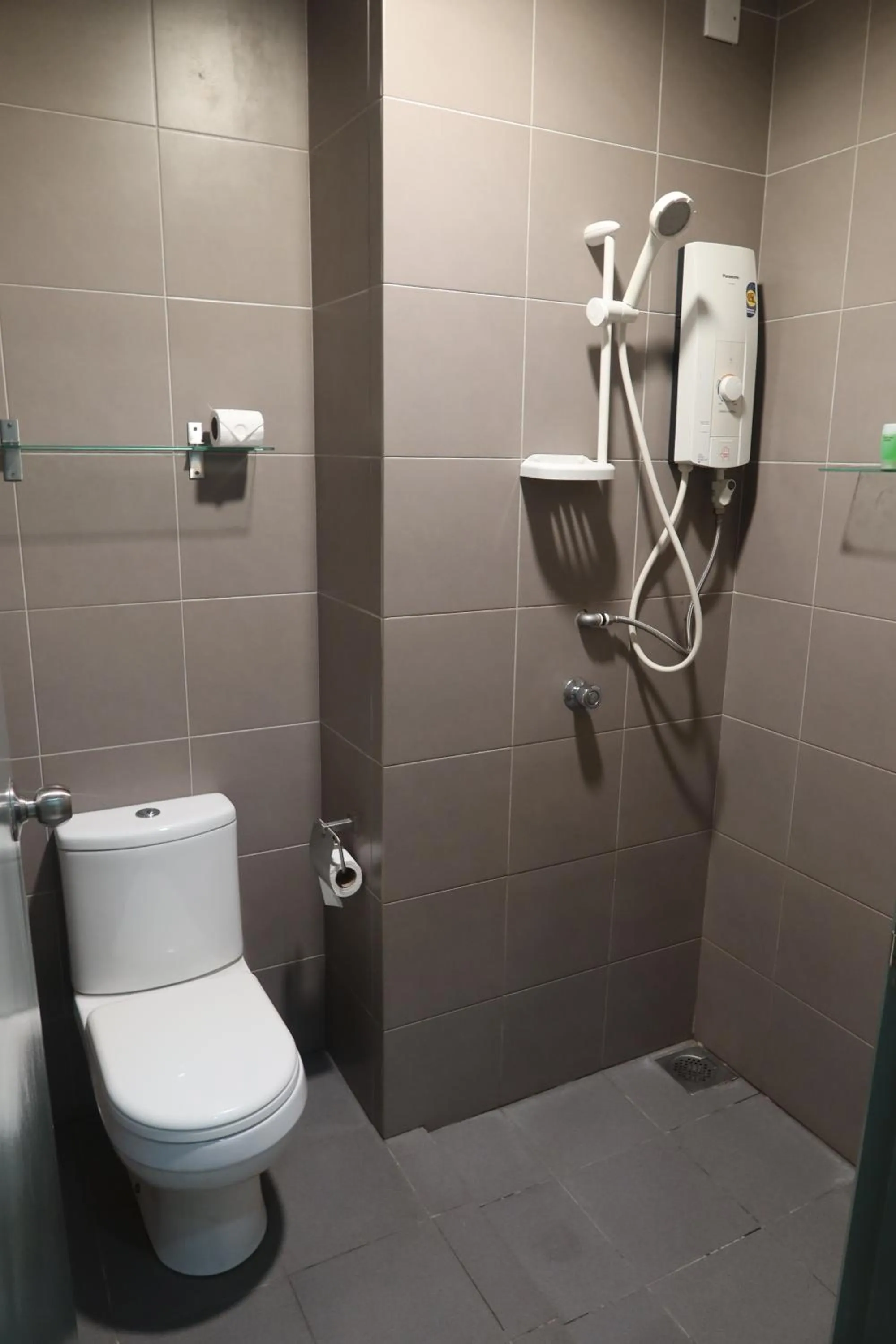 Toilet in Summer Suites Residences by Subhome