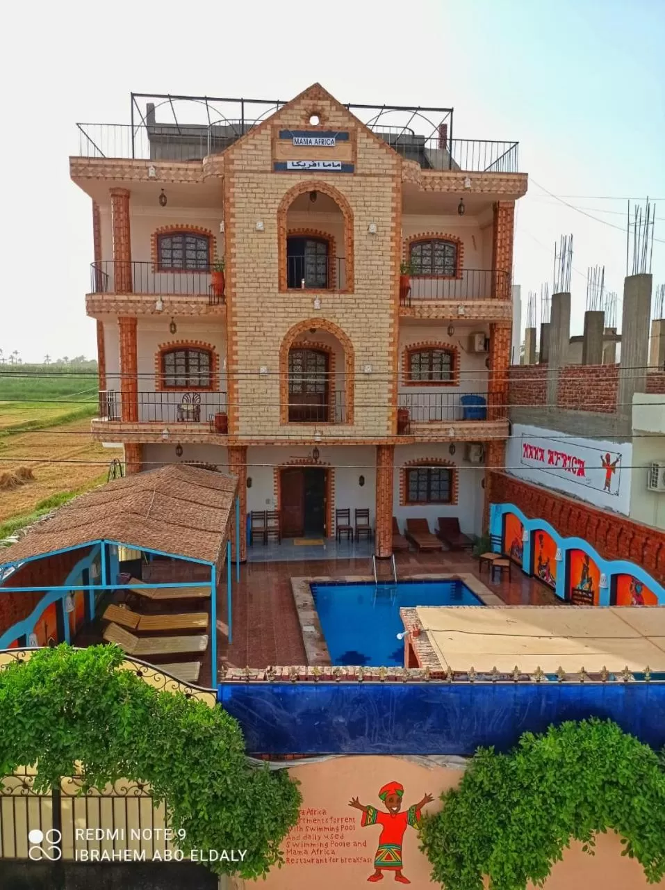 Swimming pool in Mama Africa Apts & Studios