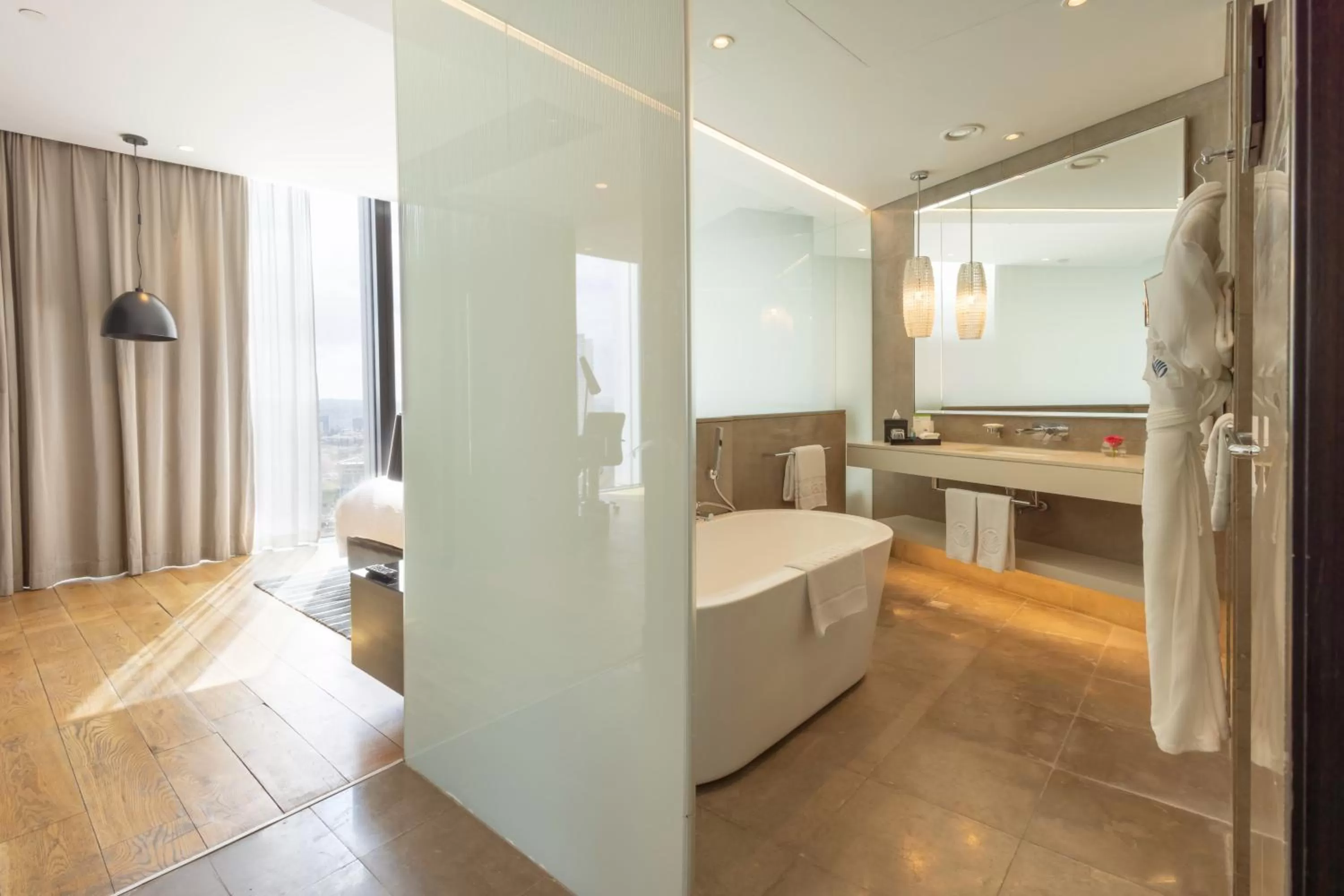 Bathroom, Bed in Amman Rotana