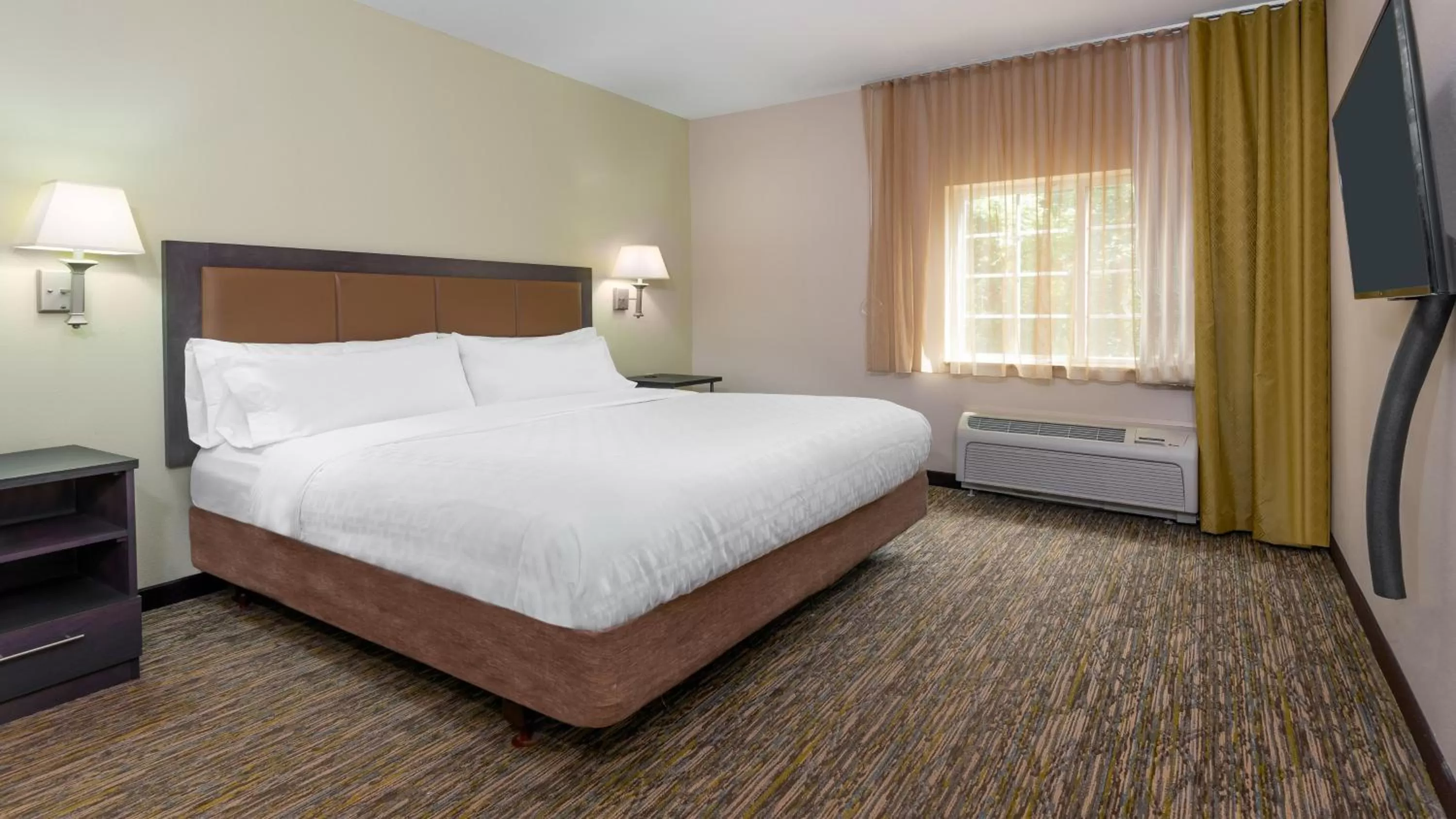 Photo of the whole room, Bed in Candlewood Suites Athens by IHG