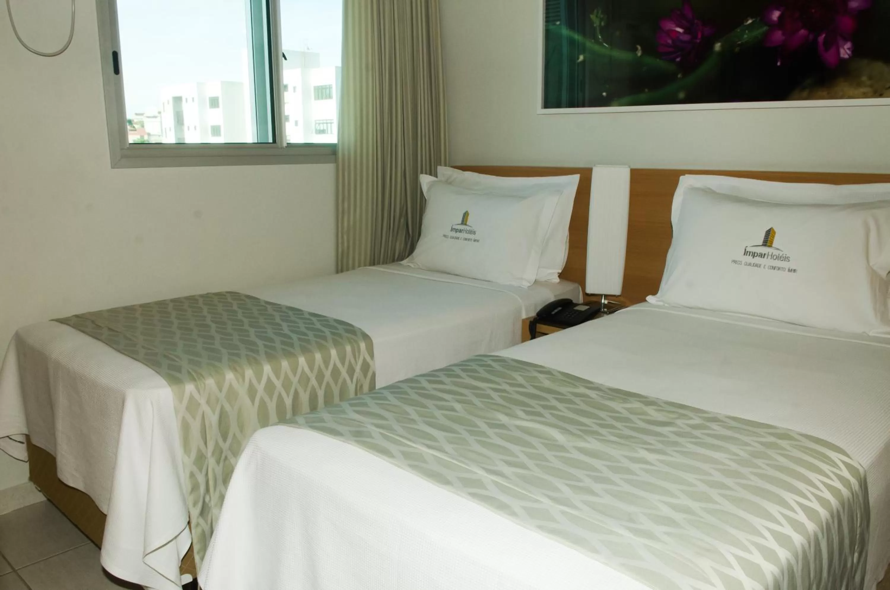 Bed in Ímpar Suítes Cidade Nova