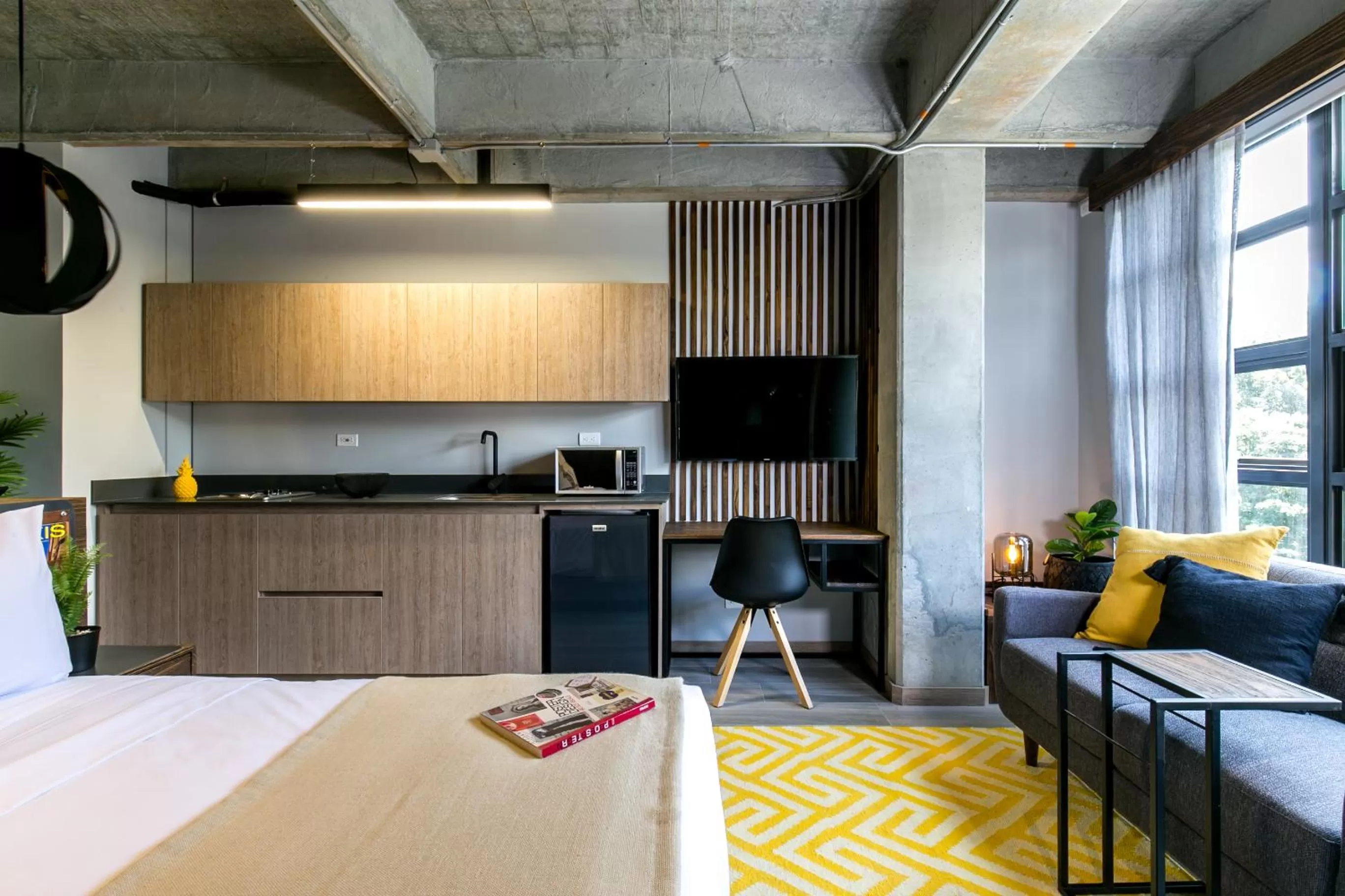 Bed in Factory Lofts Hotel