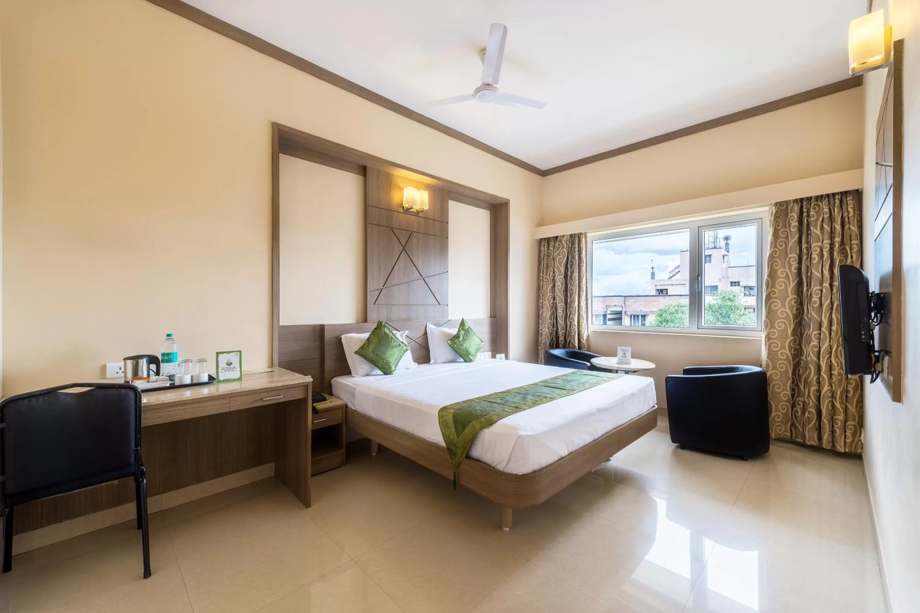 Photo of the whole room, Bed in Treebo ESS Grande