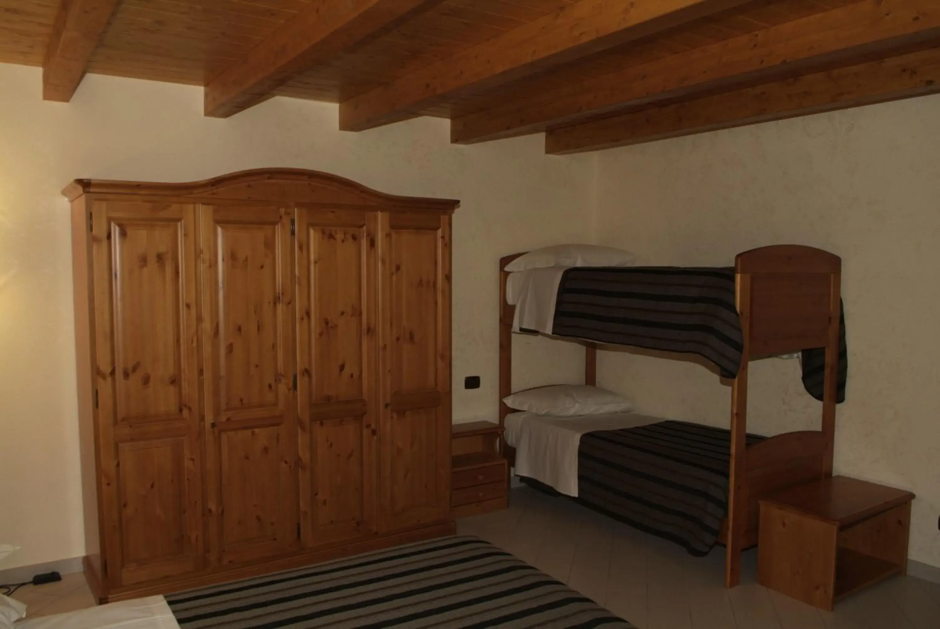 Quadruple Room - single occupancy in Locanda Dal Sor Francesco Quadruple Room - single occupancy in Locanda Dal Sor Francesco