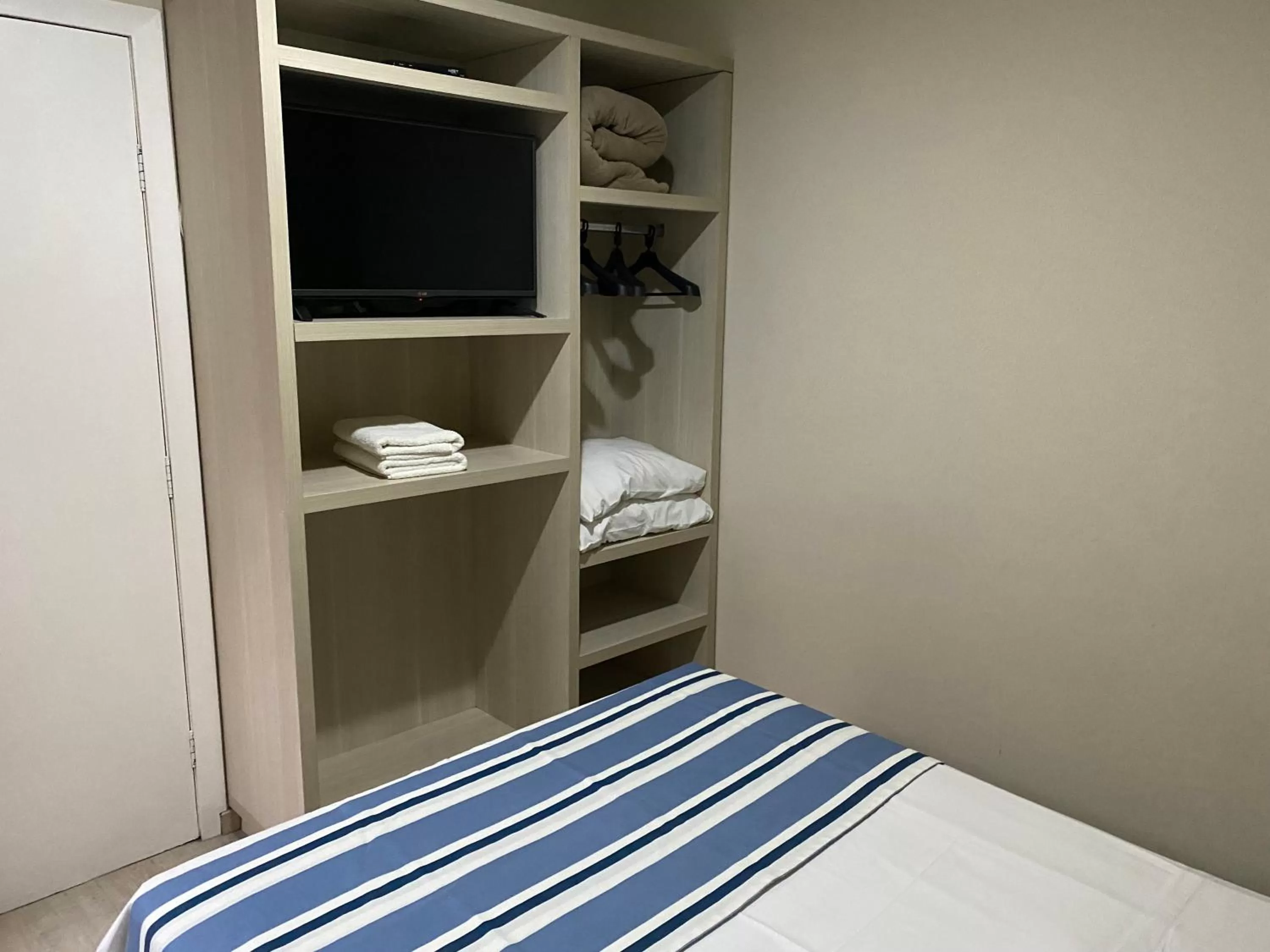 TV/Entertainment Center in Hotel Sol By MRHotelaria