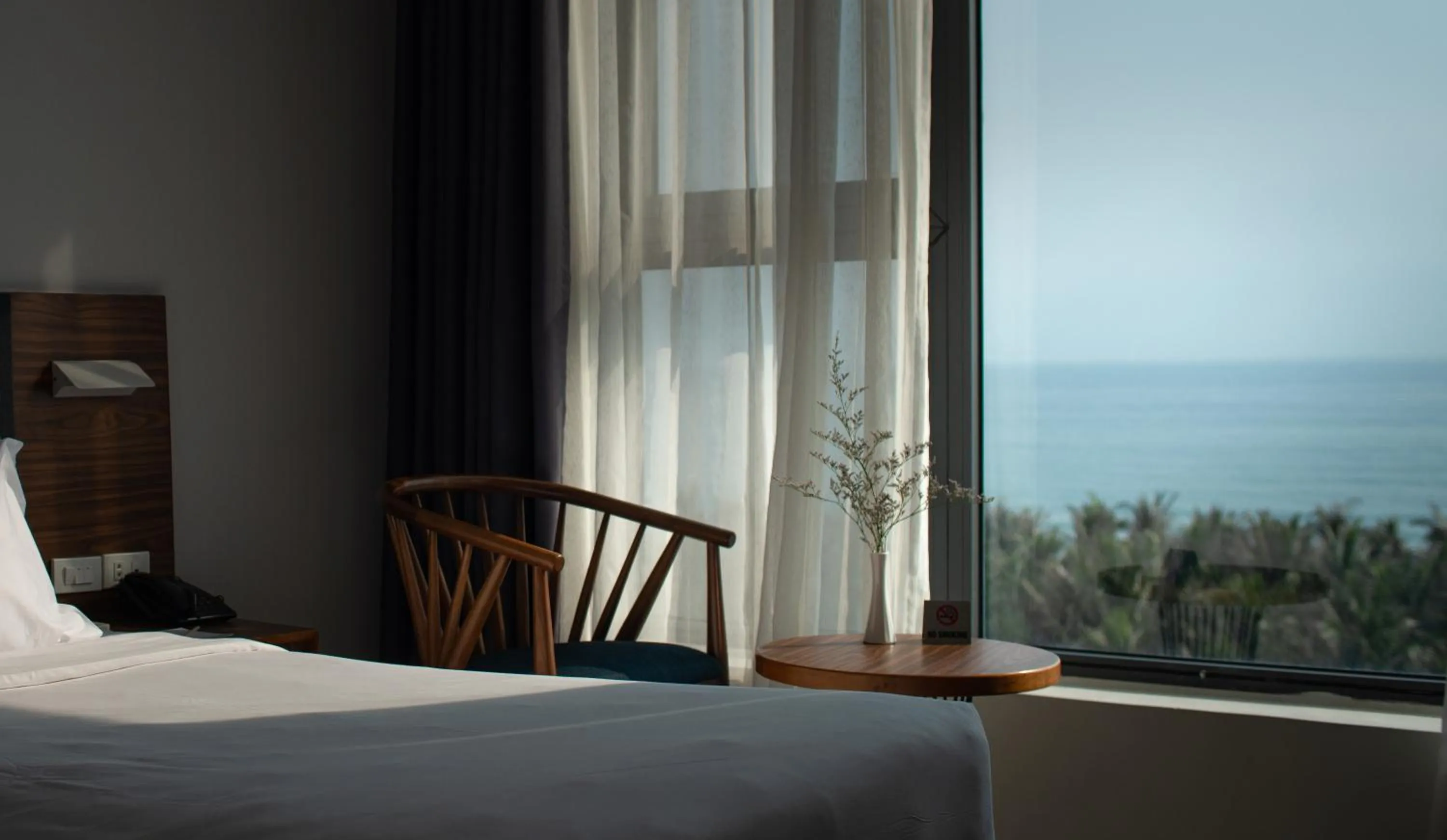 View (from property/room), Bed in Sala Tuy Hoa Beach Hotel