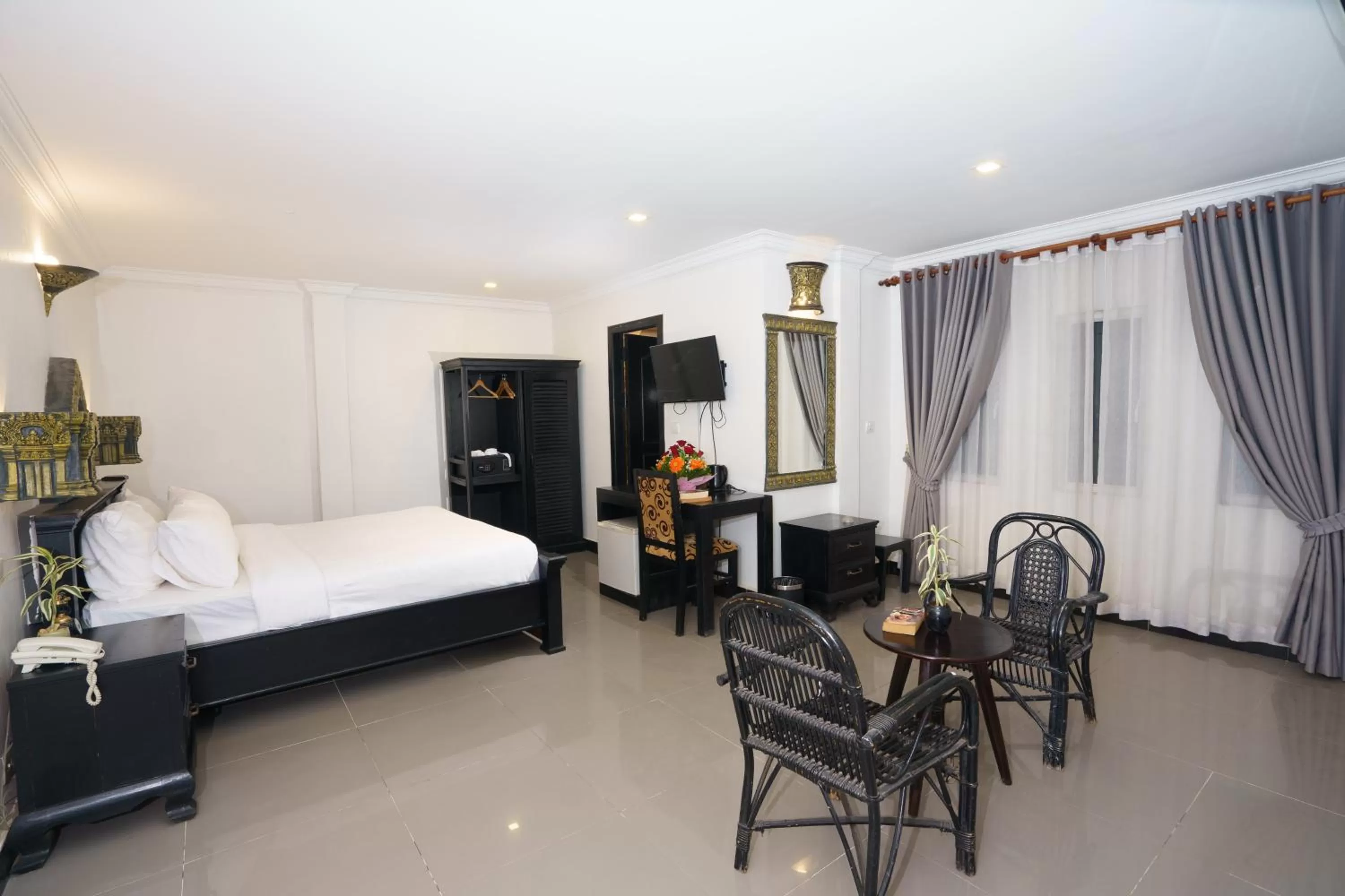 Living room, Bed in The Rabbit Hole Hotel & SPA