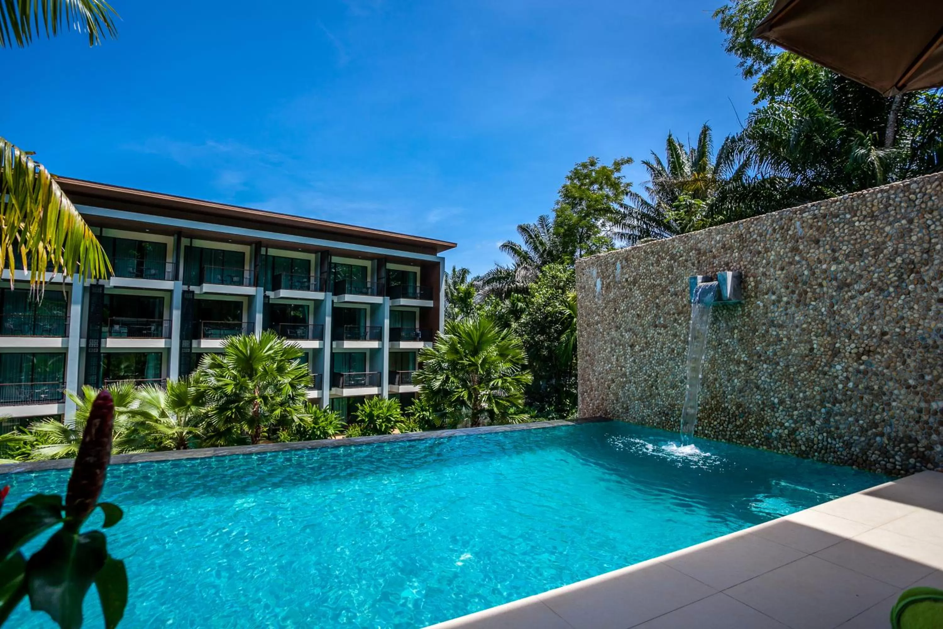 Swimming pool in HULA HULA RESORT l truly tropical and fun wellness