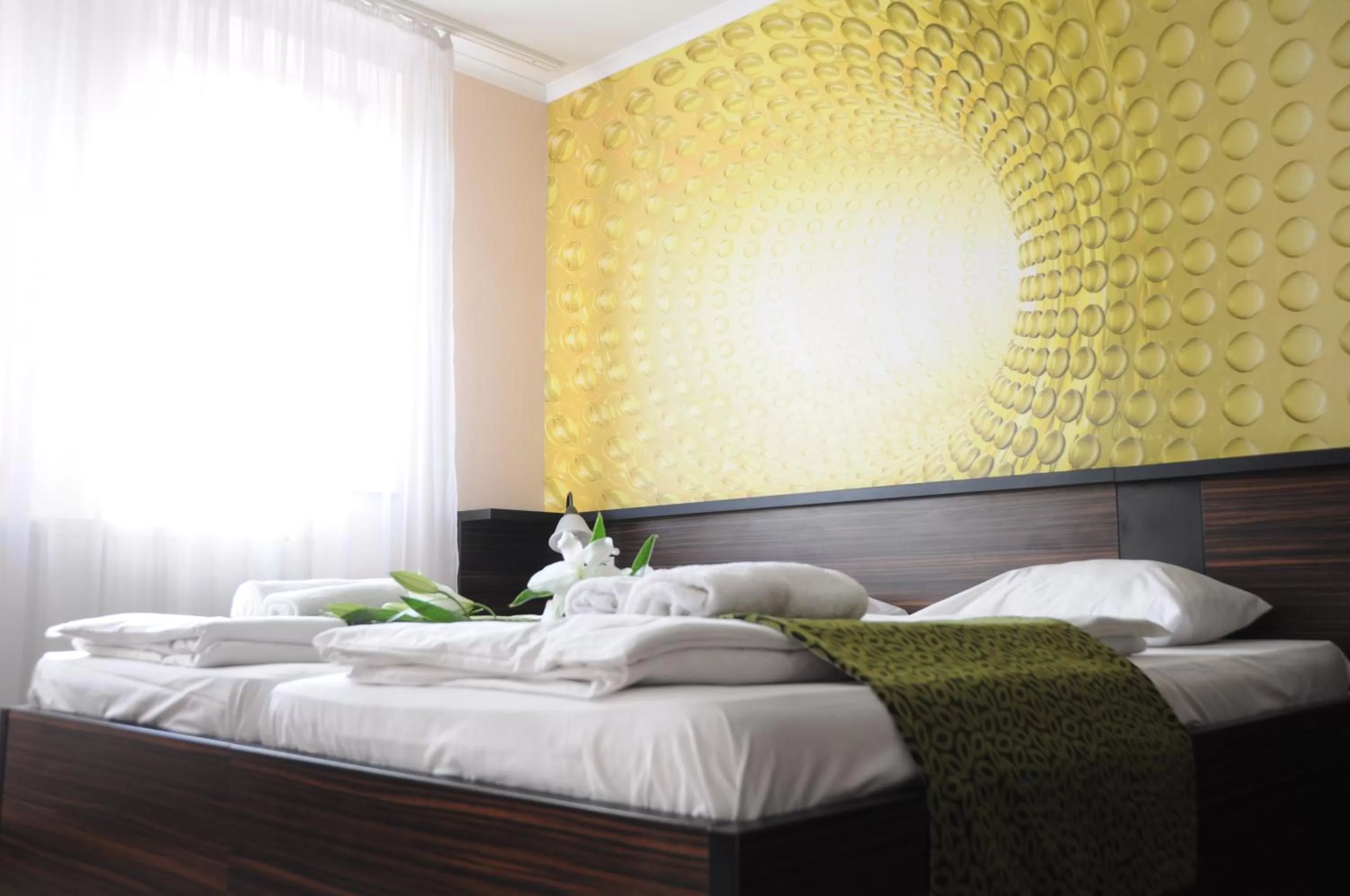 Bed in Green Hotel Budapest