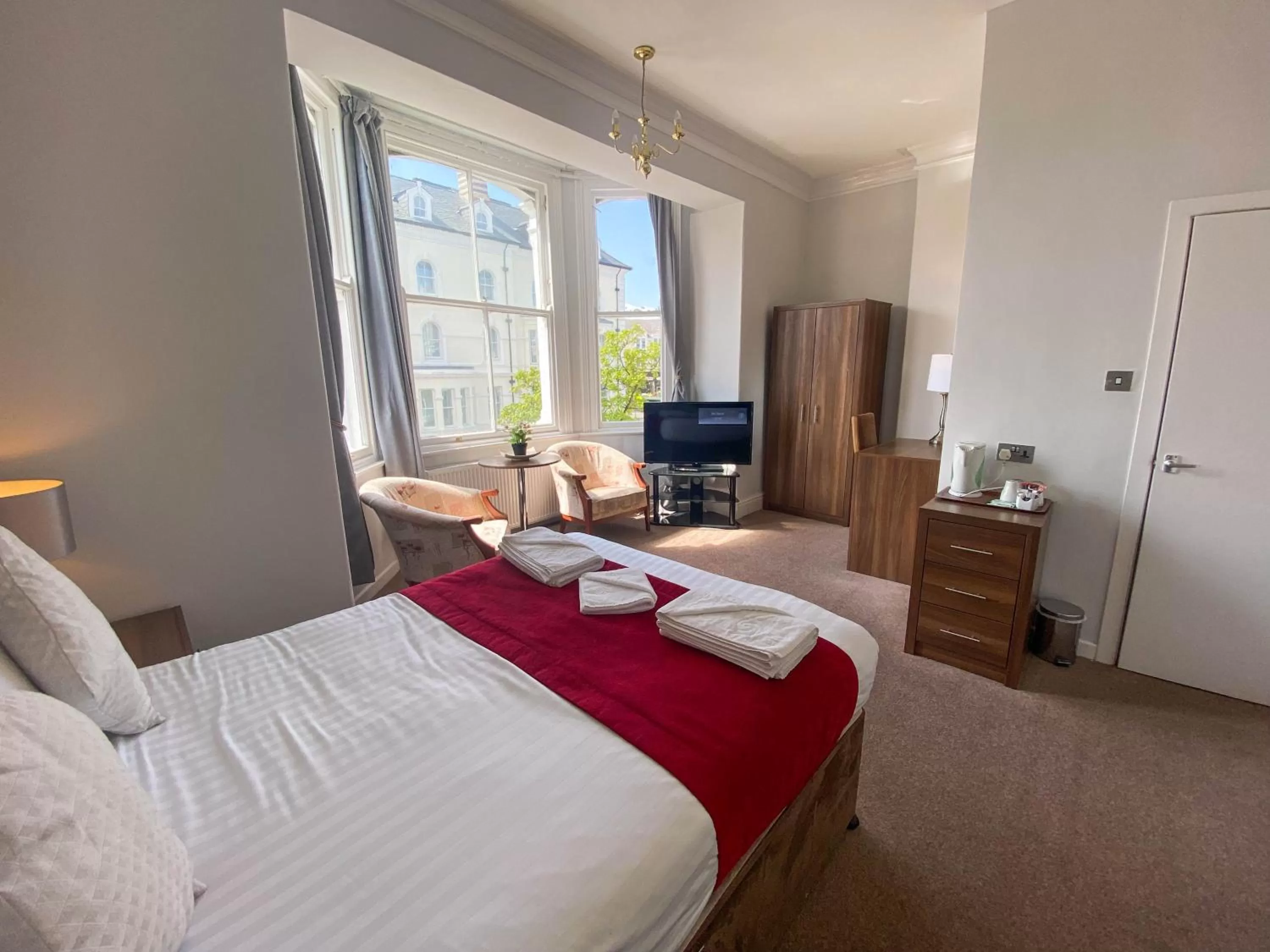 Bed in The Broadway Hotel