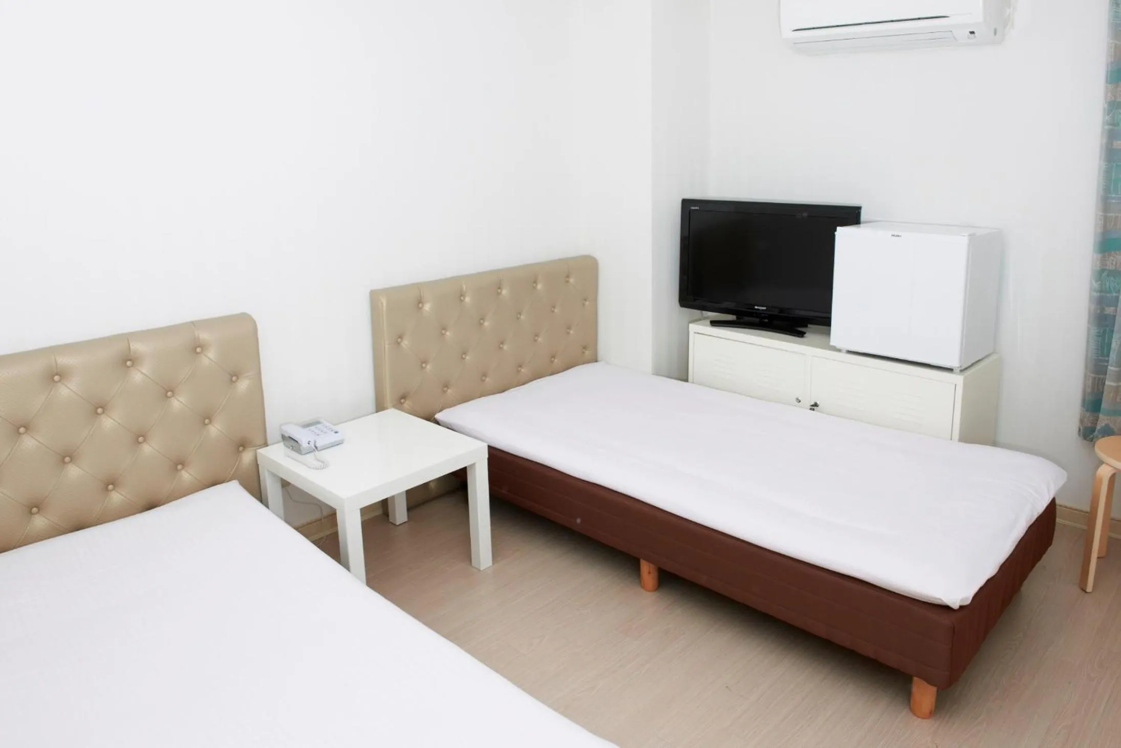 Bed in Hotel Empire in Shinjuku