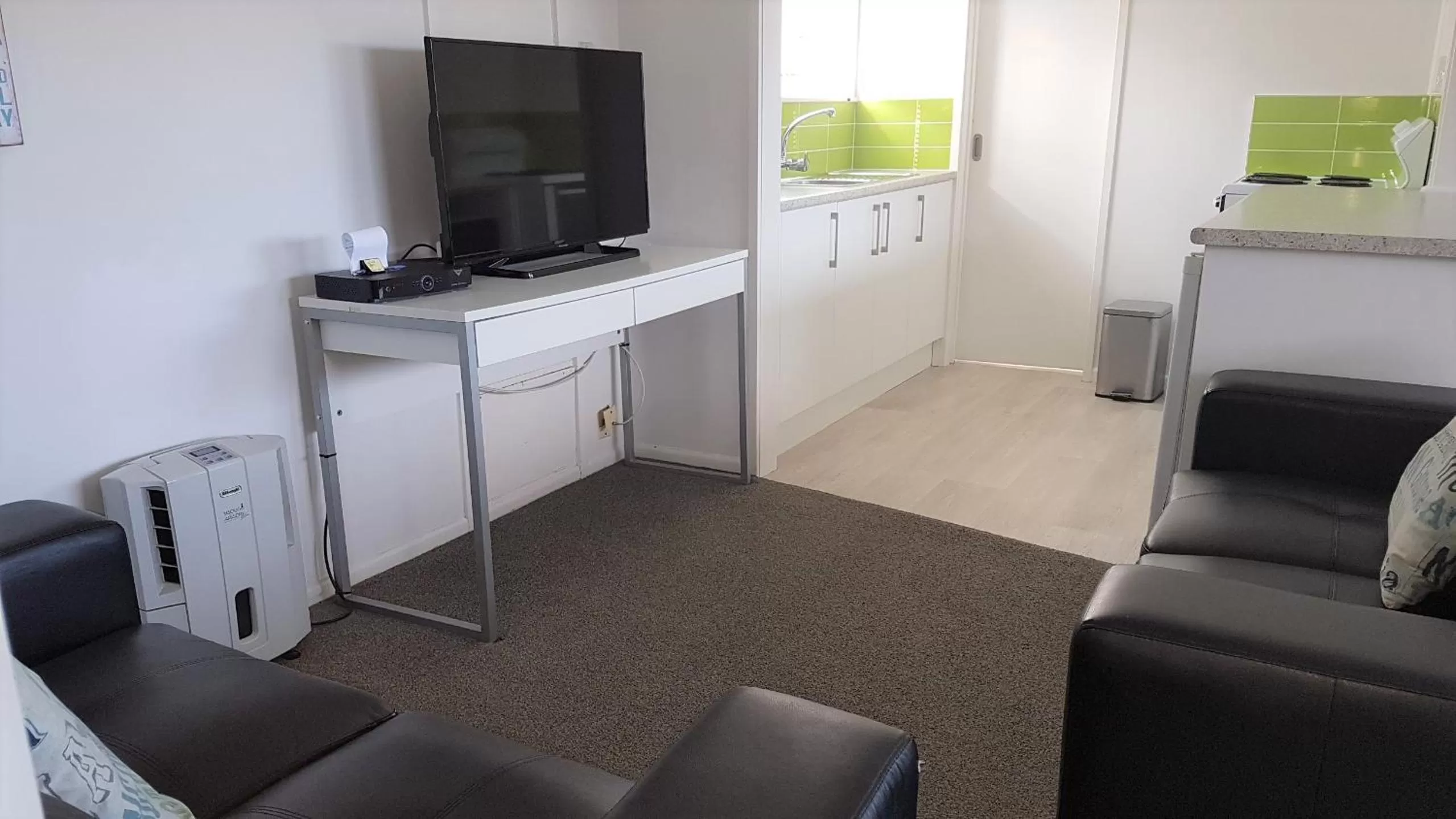 Living room, TV/Entertainment Center in 52 on Rifle Motel