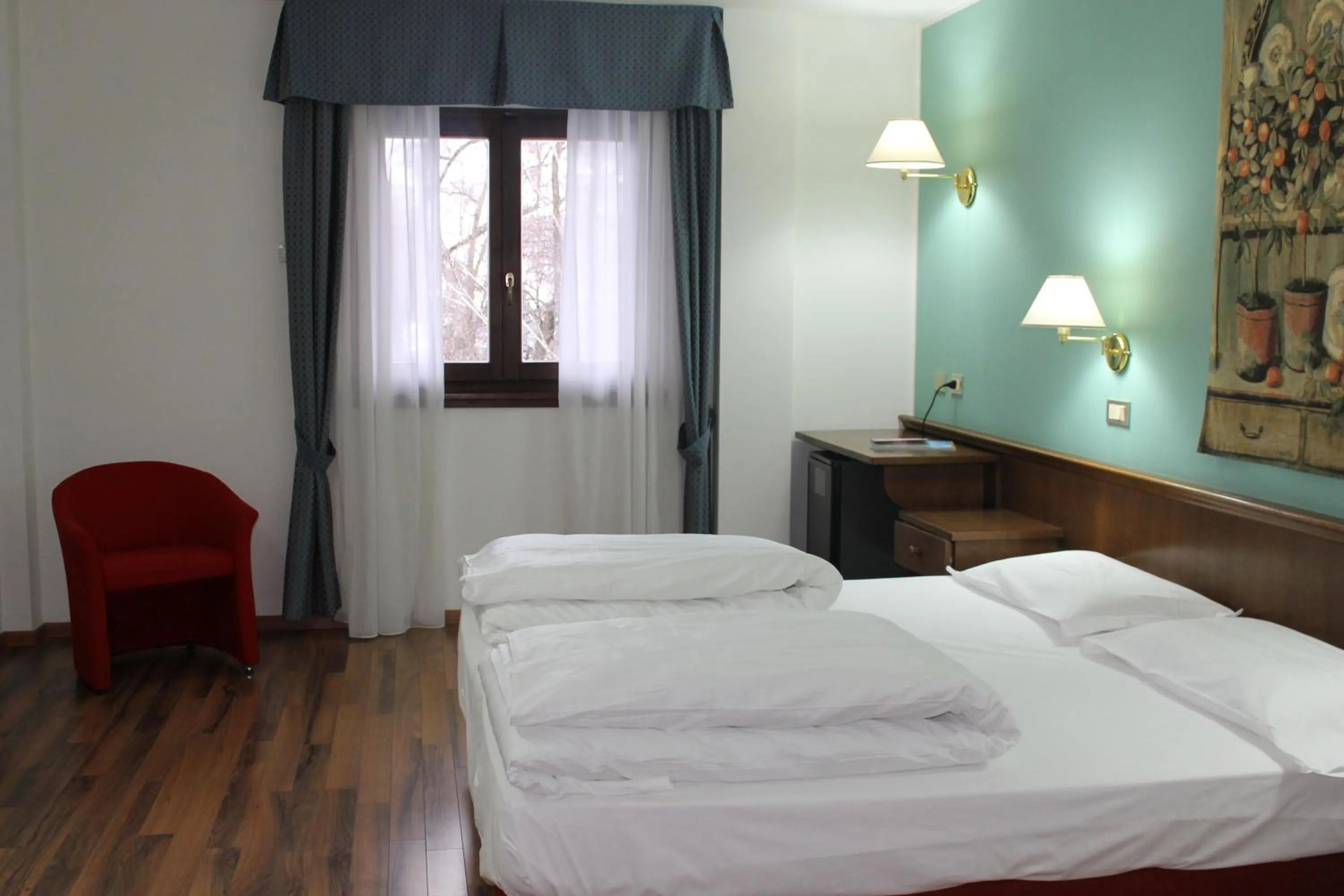 Photo of the whole room, Bed in Hotel Baita Clementi