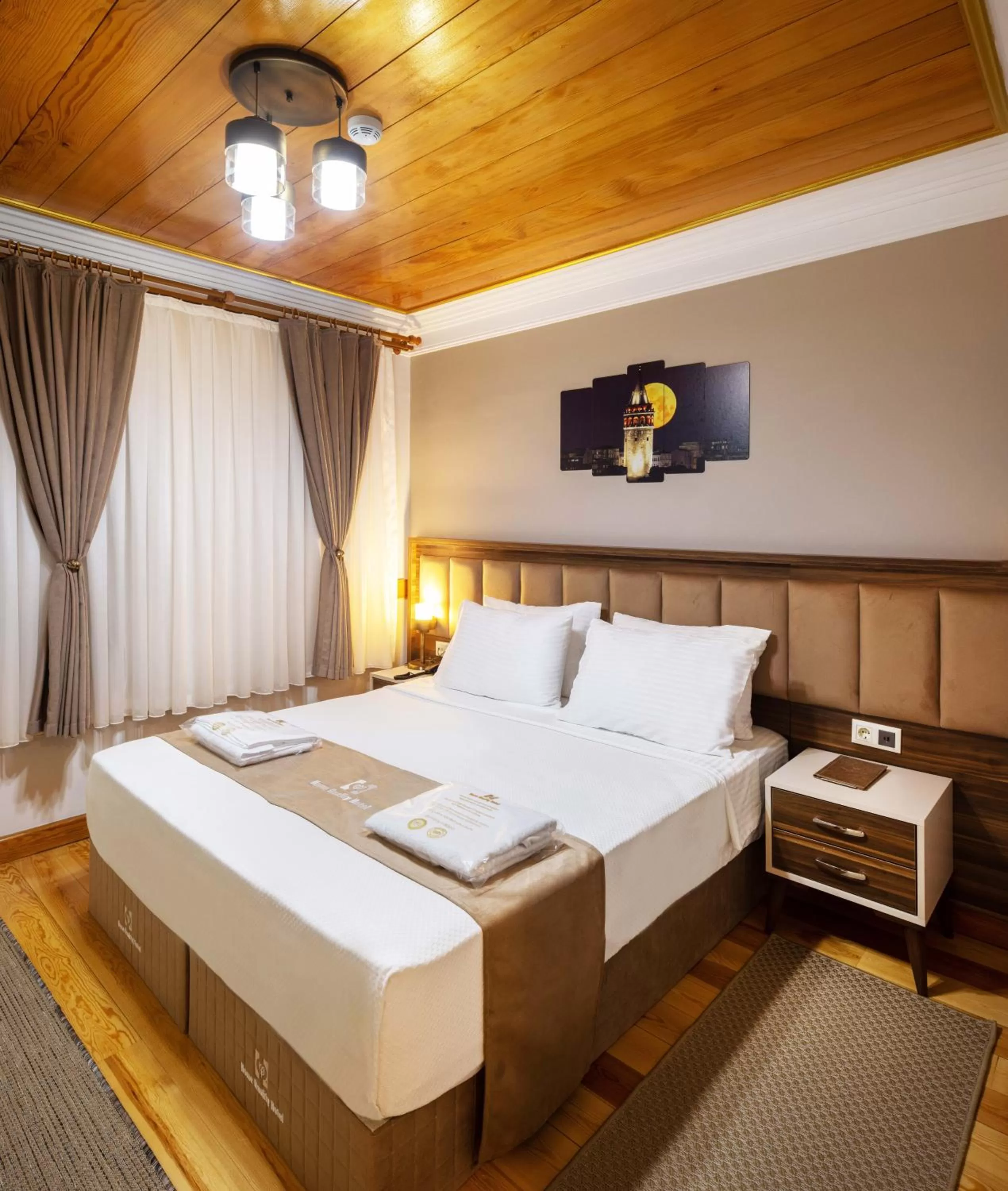 Bedroom in HOME QUALITY HOTEL