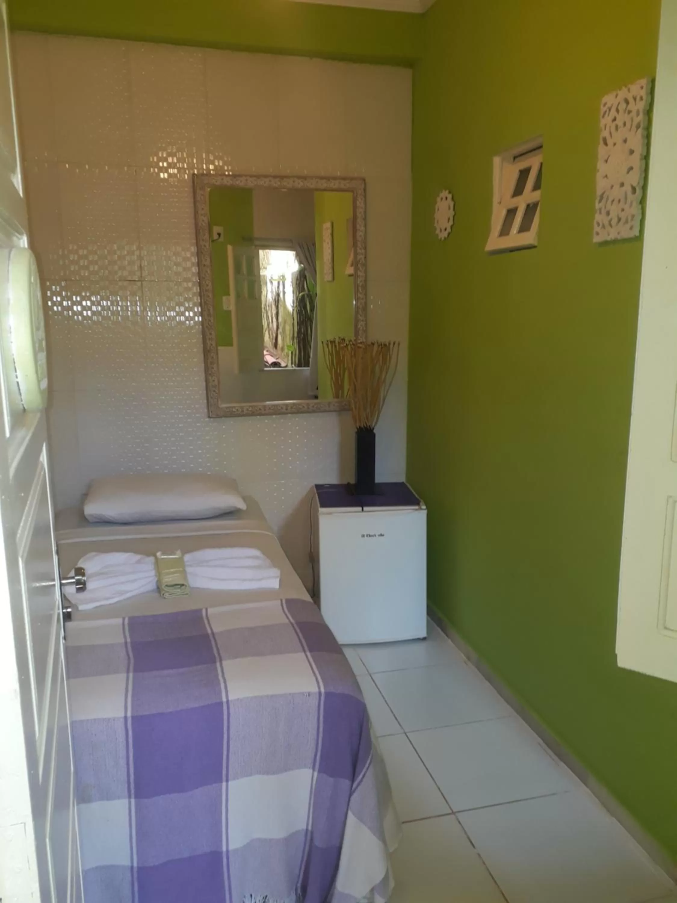 Bed in Hotel Pousada Papaya Verde